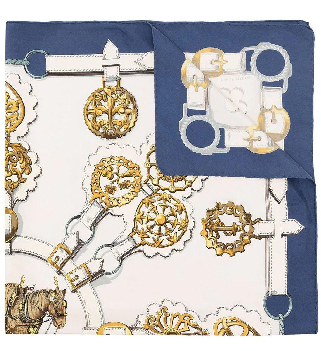 Crafted in France from the finest yellow silk, this pre-owned scarf by Hermès features lightweight construction, a square shape and print motifs. Designed by Françoise De La Perriere for Hermes and first issued in 1963, this scarf depicts an