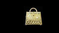 Hermès Curiosity Kelly Bag Pendant Charm Permabrass Metal