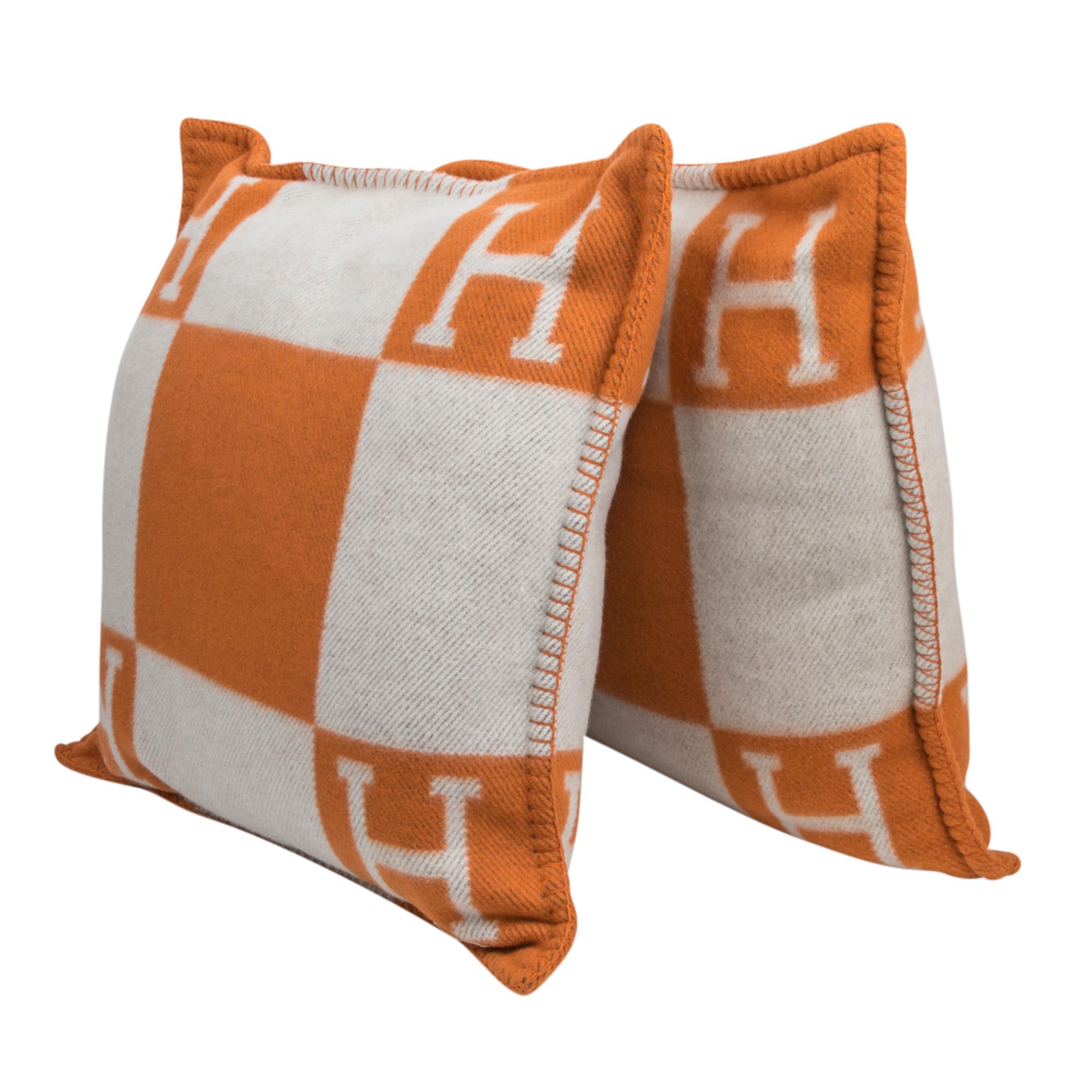Mightychic offers a guaranteed authentic Hermes classic set of two PM Avalon I signature H pillow featured in Orange.
The removable cover is created from 85% Wool and 15% cashmere and has whip stitch edges.
New or Pristine Store Fresh Condition. 