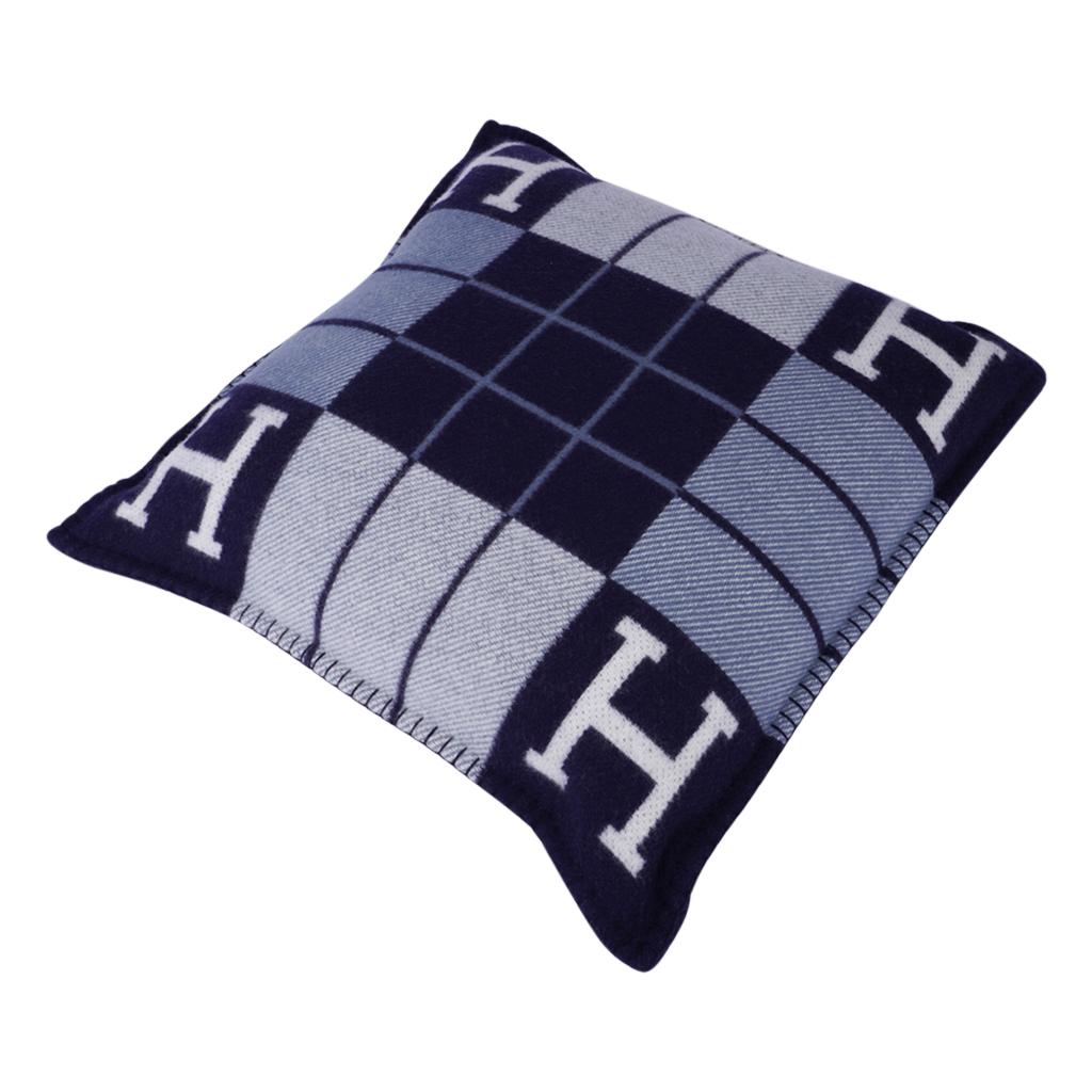 Mightychic offers a guaranteed authentic Hermes classic Small Model Avalon III signature H pillow set of two featured in Caban and Ecru.
The removable cover is created from 90% Wool and 10% cashmere and has whip stitch edges.
**Please see the