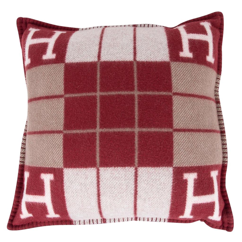 Mightychic offers a guaranteed authentic Hermes classic Small Model Avalon III signature H pillow features Rouge H and Ecru.
The removable cover is created from 90% Wool and 10% cashmere and has whip stitch edges.
New or Pristine Store Fresh