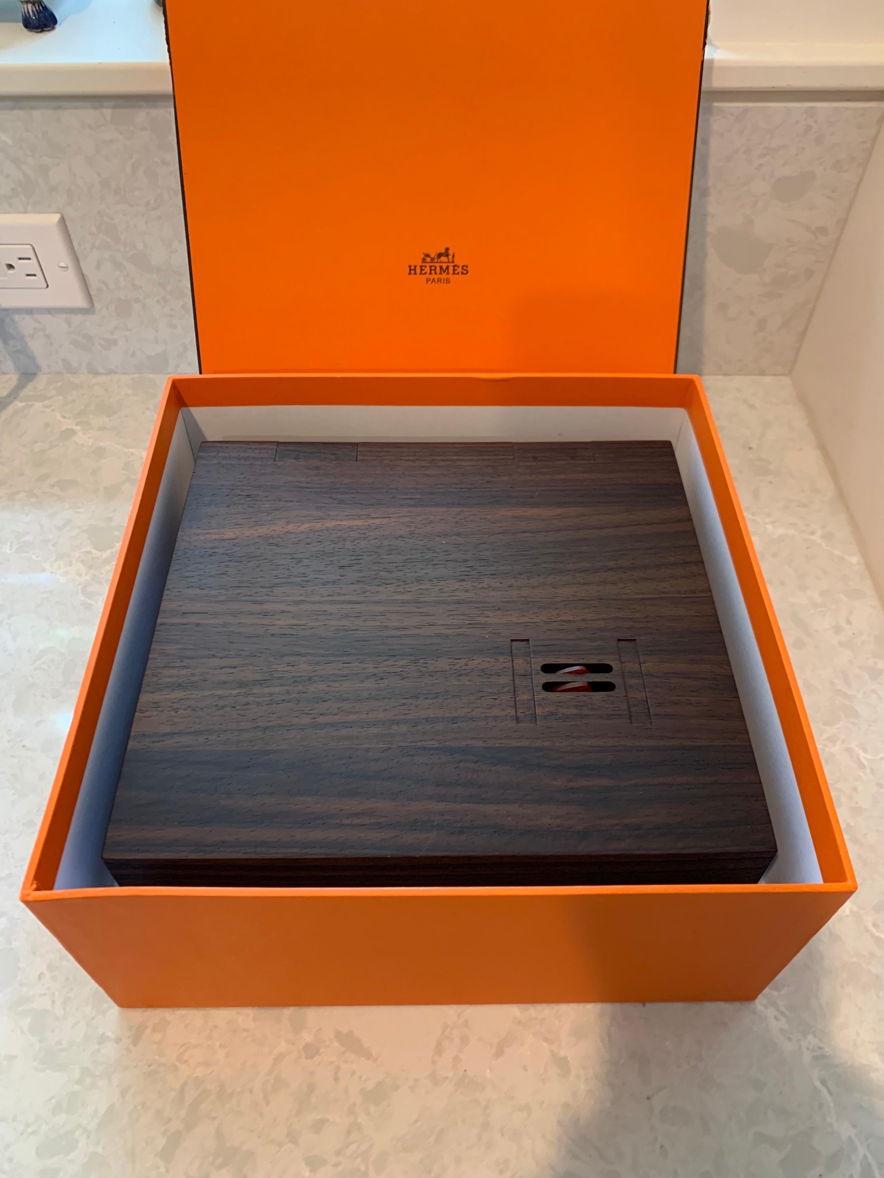 Rare limited edition custom wood and leather Hermes desk top stationary set that has never been used
and comes with original Hermes orange box. The perfect gift for the person who thought they had everything.
