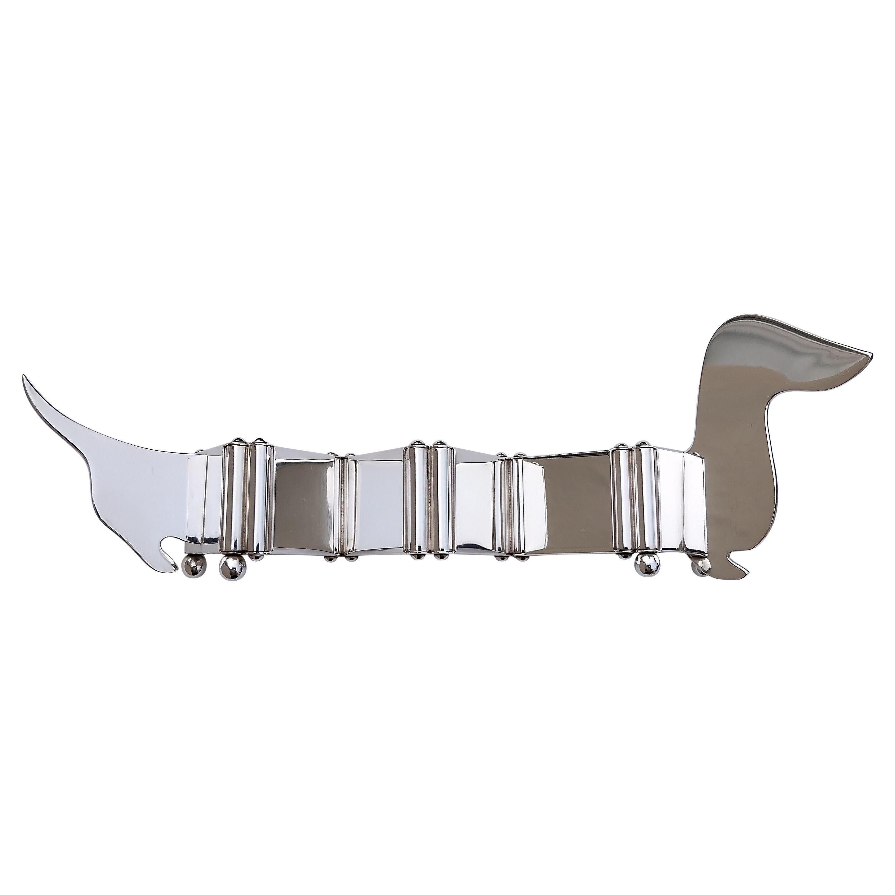 Exceptional and Extremely Rare Authentic Hermès Photos Frame

Absolutely stunning, a true collector item for all Hermès and Dachshund lovers!

In shape of a dachshund, 