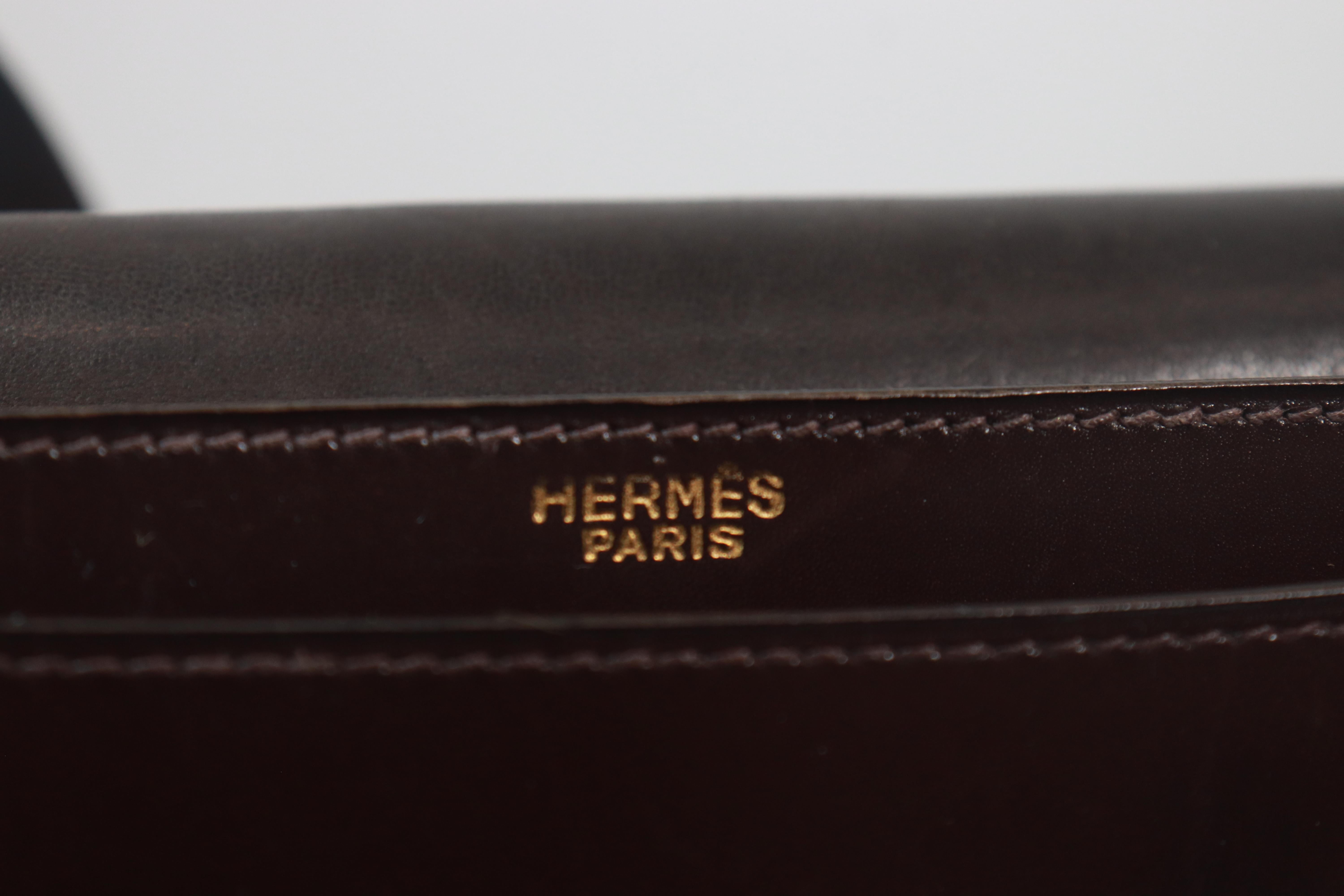HERMÈS Dark Brown Leather Crossbody Bag with Gold Buckle and Adjustable Strap For Sale 5