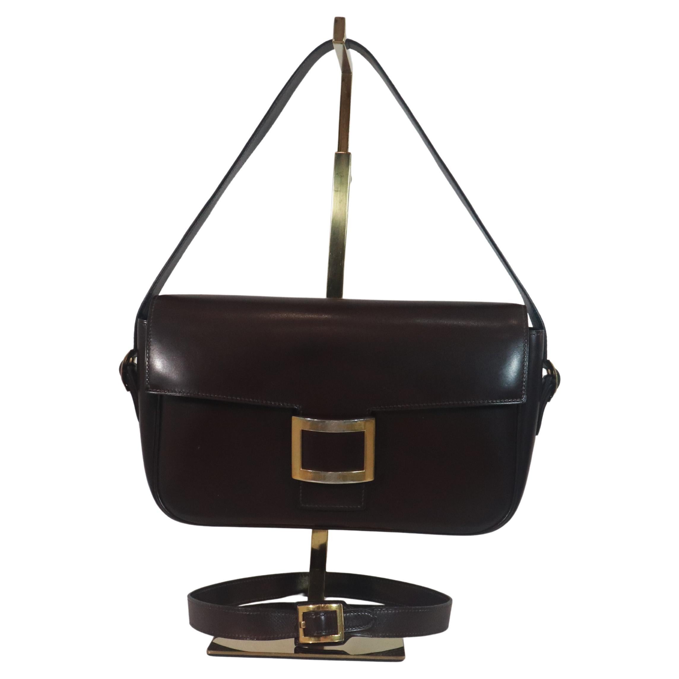 HERMÈS Dark Brown Leather Crossbody Bag with Gold Buckle and Adjustable Strap