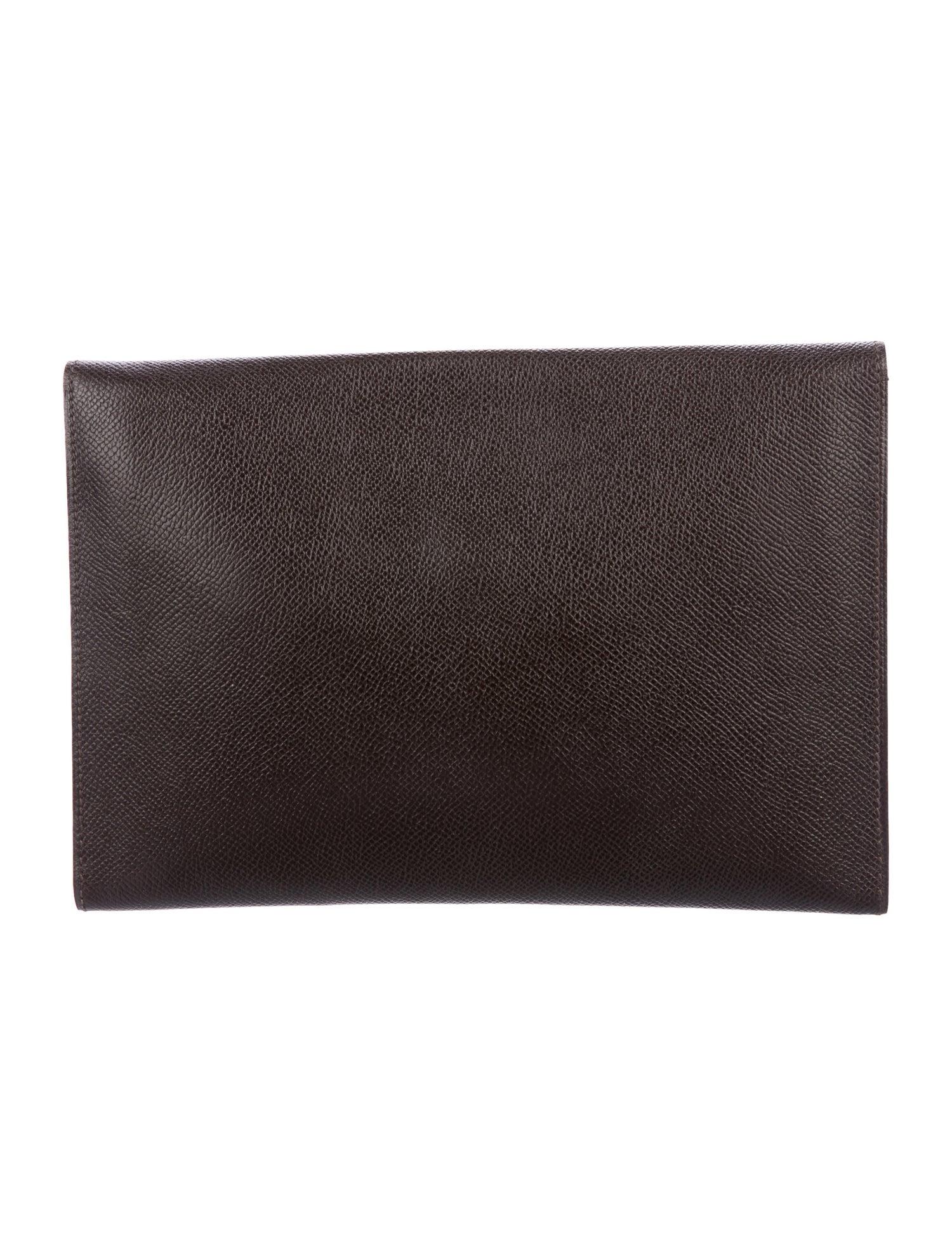 Hermes Dark Brown Leather Gold 'H' Logo Button Envelope Evening Clutch Bag

Leather
Gold tone hardware
Leather lining
Snap closure
Made in France
Measures 9.5