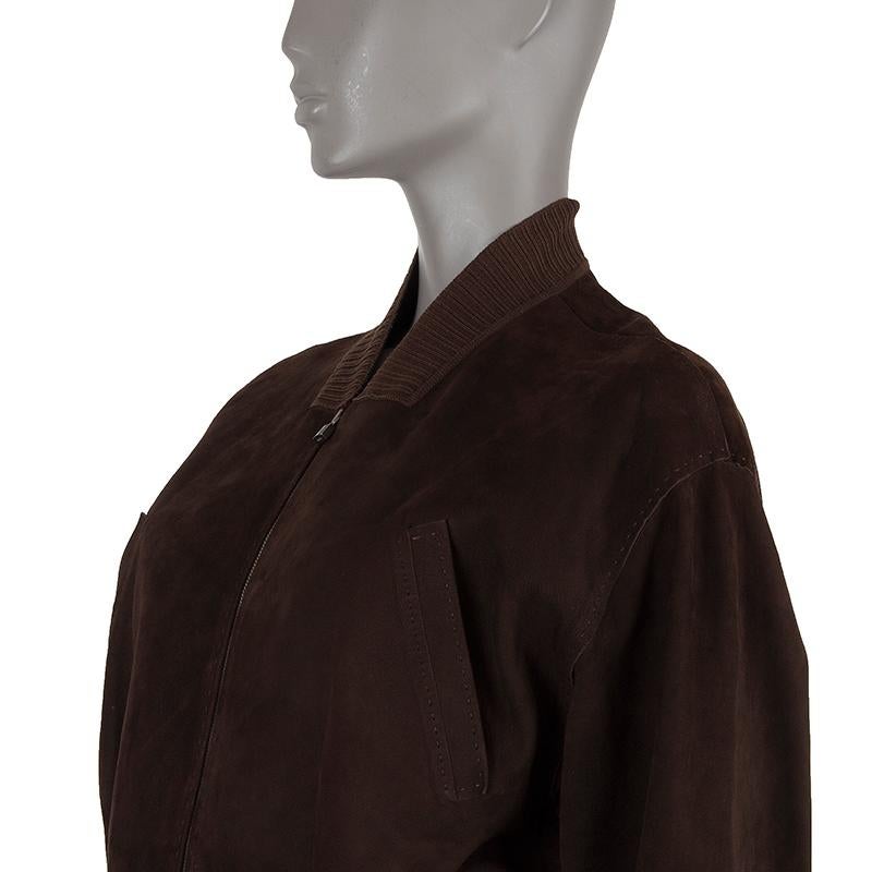 Hermes cropped bomber jacket in dark brown lambskin suede and cotton (100%). With ribbed detailsand two pockets on the front. Has been worn and is in excellent condition. 

Tag Size 42
Size L
Shoulder Width 50cm (19.5in)
Bust 104cm (40.6in) to 114cm