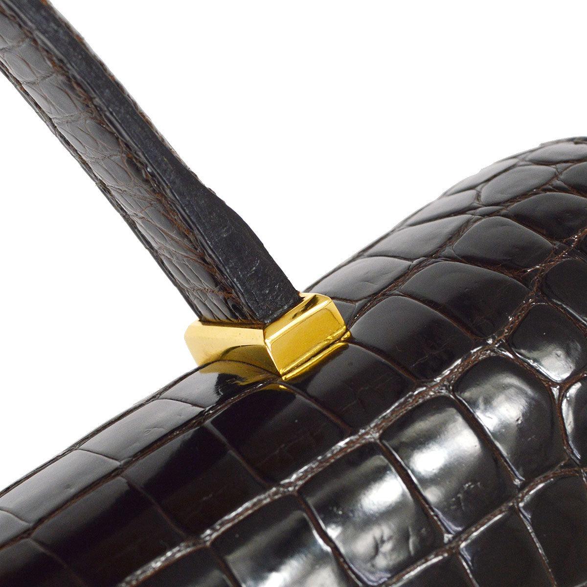 Women's HERMES Dark Chocolate Brown Piano Crocodile Porosus Gold Hardware Top Handle Bag