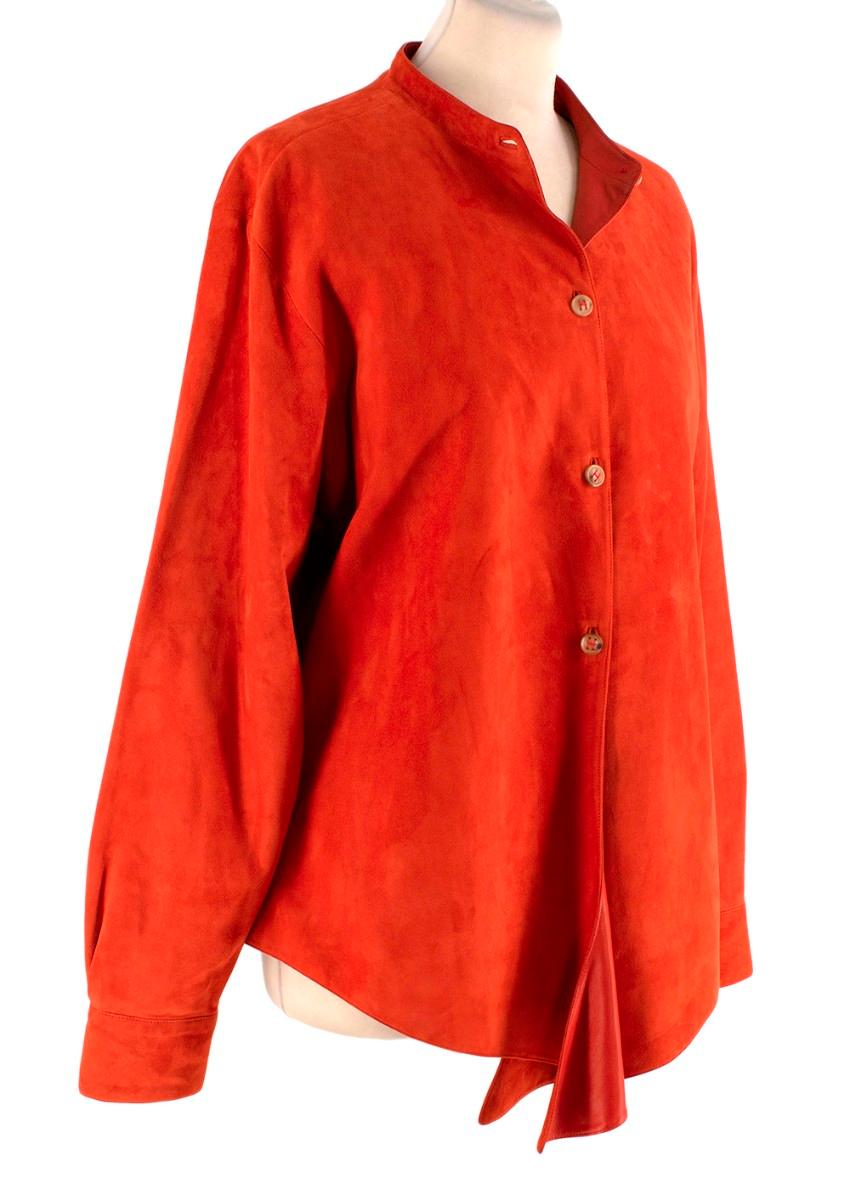 Hermes Dark Coral Vintage Suede Button Up Shirt Jacket
 

 - Suede shirt in dark coral lined with smooth leather
 - Front button-up closure, band collar
 - Button finished cuffs
 - Curved hemline to the front
 - Option to wear buttoned up as a