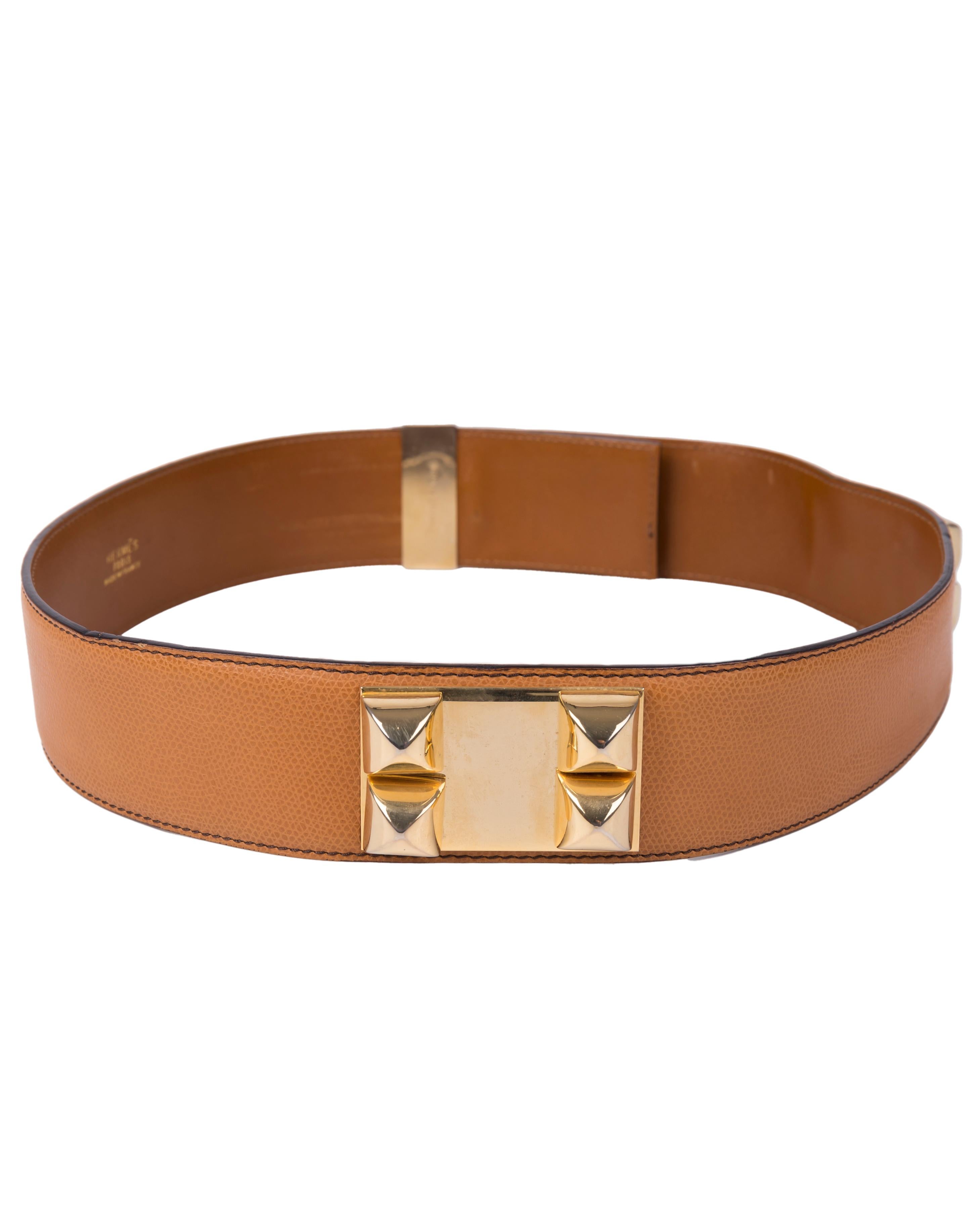 - Tan leather belt
- Gold plated hardware
- Brown stitching