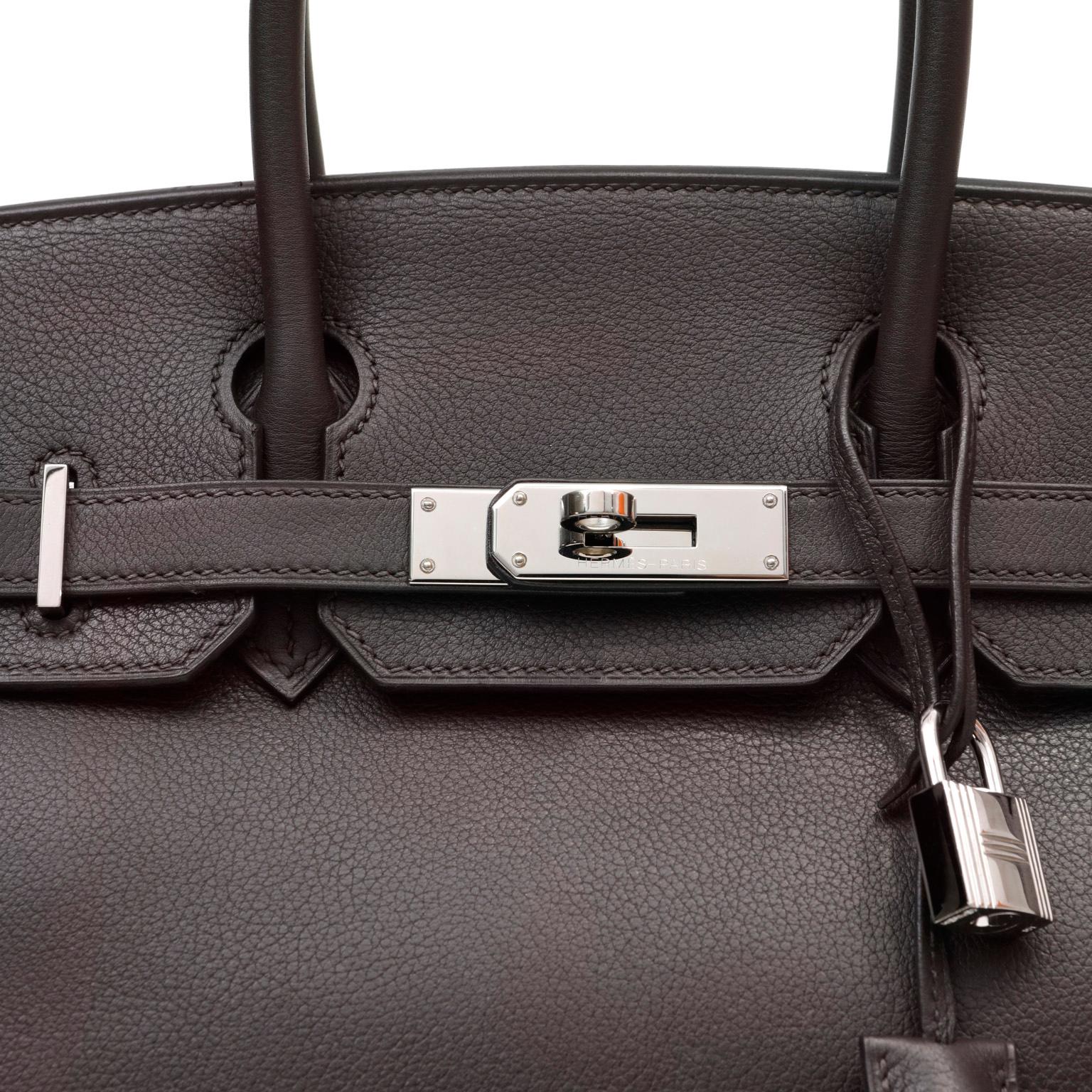 This authentic Hermès Deep Brown Evergrain 30 cm Birkin is in pristine condition.  Hand sewn and coveted worldwide; the Hermès Birkin is considered the epitome of luxury handbags.  Deep Havana Brown evokes the darkest espresso bean and is perfectly