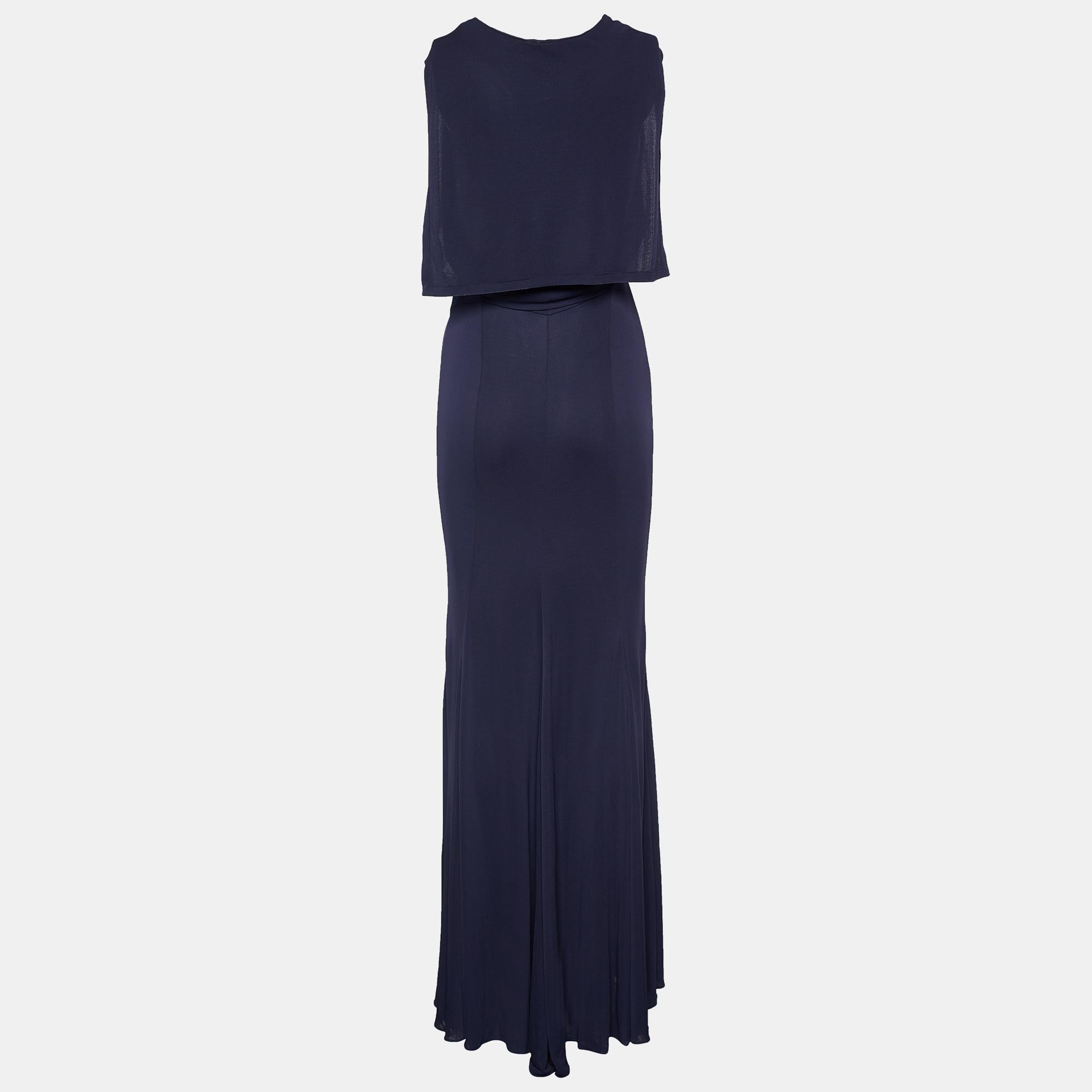 Intricately tailored into a leaner, graceful silhouette, this maxi dress from the house of Hermès will add a luxurious edge to your look. It has been finely stitched using purple knit fabric with a striking neckline. Embrace a simplistic yet elegant