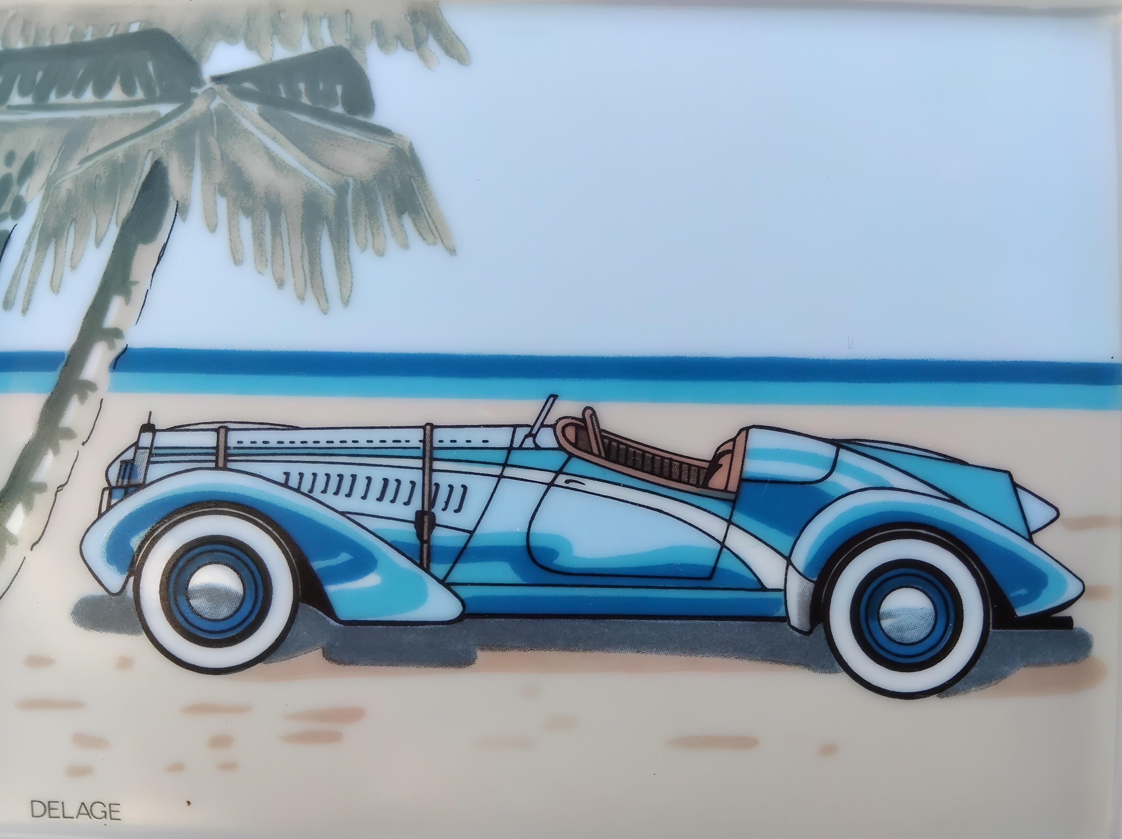 Eccezionale posacenere autentico di Hermès 

Stampa: Delage D6 o D8 (scusate l'ignoranza :) 

Delage è un famoso marchio francese di auto di lusso, fondato nel 1905 da Louis Delage.

Delage era rinomata per la raffinatezza tecnica delle sue auto di