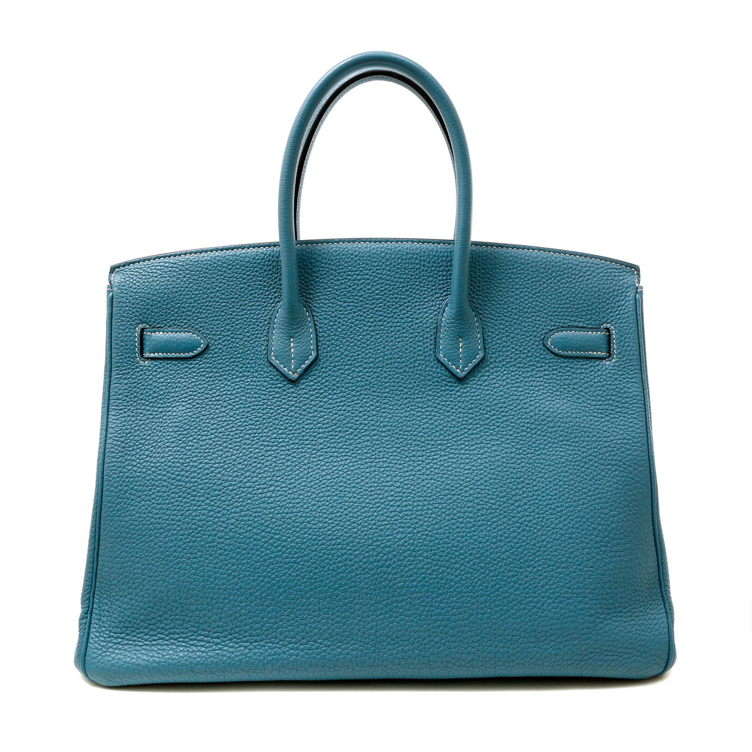 This authentic Hermès Denim Blue Togo 35 cm Birkin is in pristine condition.  Perfectly paired with sophisticated Palladium hardware, it is a must have for blue lovers.
Textured and durable Togo leather is soft to the hand and maintains the shape of