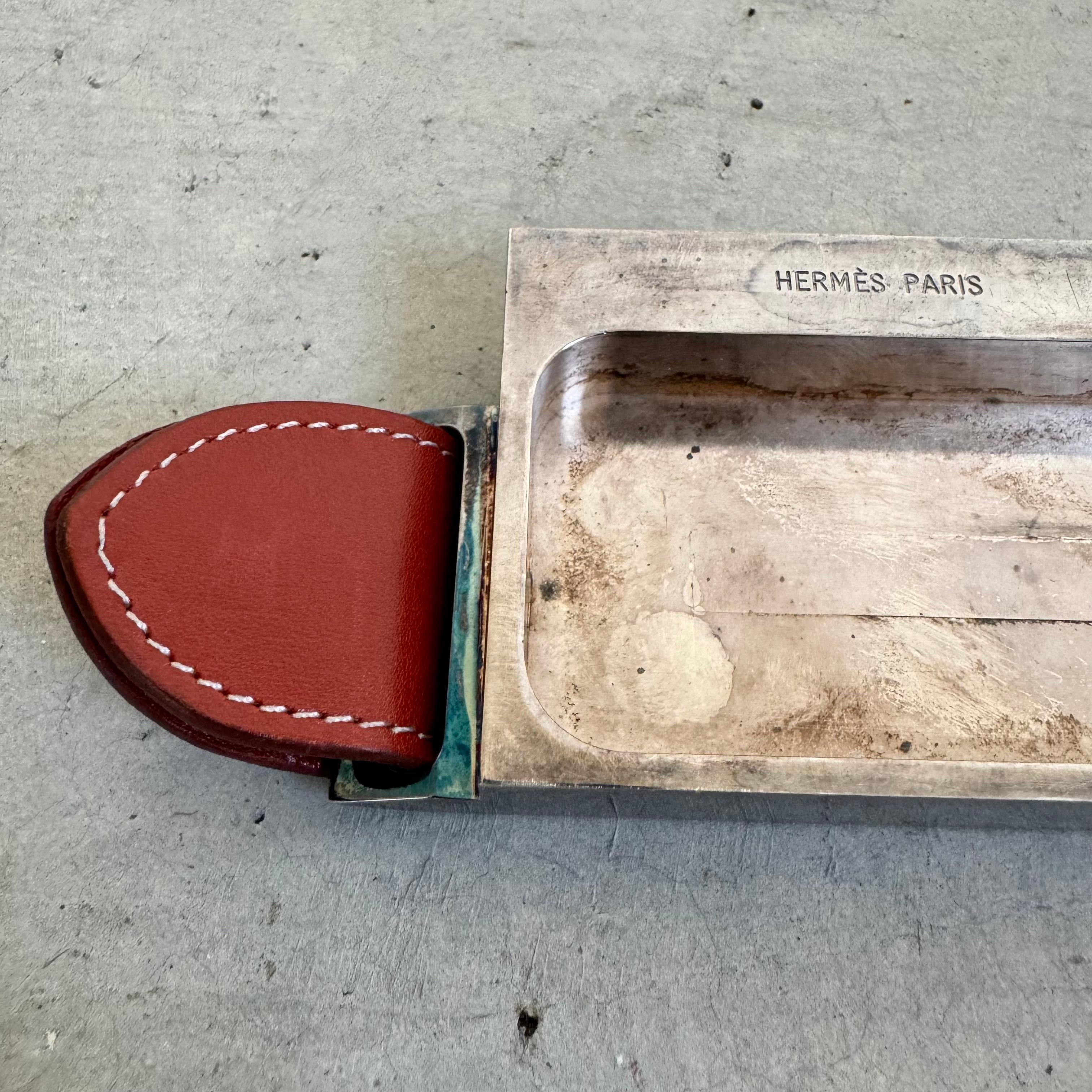 This is one of the most unique and interesting Hermés pieces we have ever come across. This piece was made in 1970s France and is a genuine Hermés collectible. 

Perfect item to display in a collection, as an accessory on a shelf, or serving its