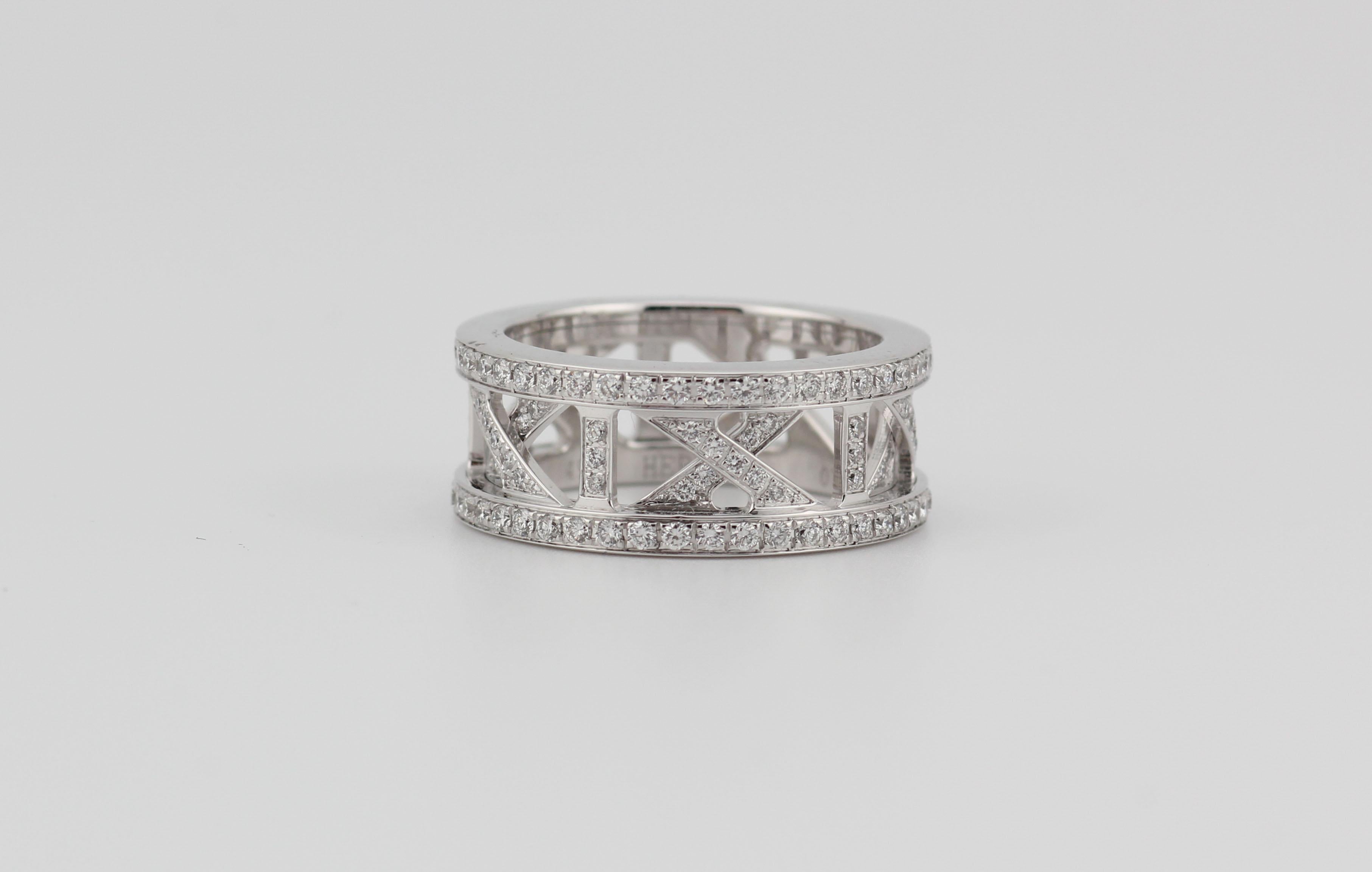 Fine diamond and 18k white gold band with a repeating Roman numeral XI pattern,  by Hermes. Size 49, US size 4.75-5.

This Hermes band is a high-end and exquisite piece of jewelry crafted by the renowned luxury brand Hermes. Known for their