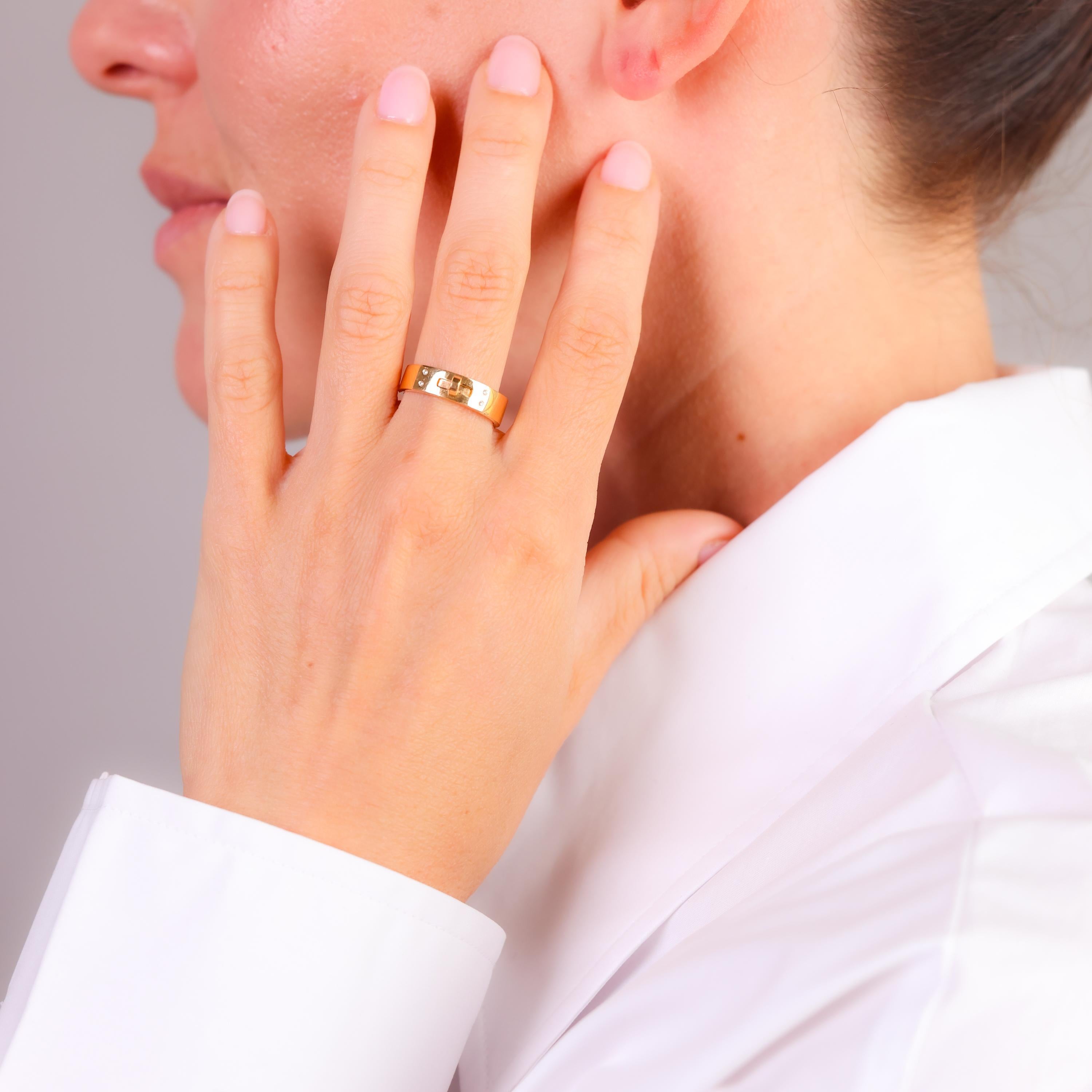 This modern Hermès ring, crafted in luxurious 18k yellow gold, features four sparkling diamonds, embodying understated elegance and refined contemporary design.

Center Stone: Diamond

Carat Weight: 0.02

Color: White

Cut: Brilliant

Color Grade: