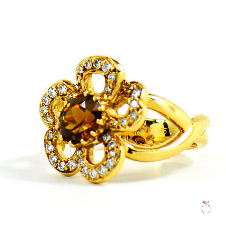 Taille ovale Hermès, bague fleur en or jaune 18 carats, diamants et citrine en vente