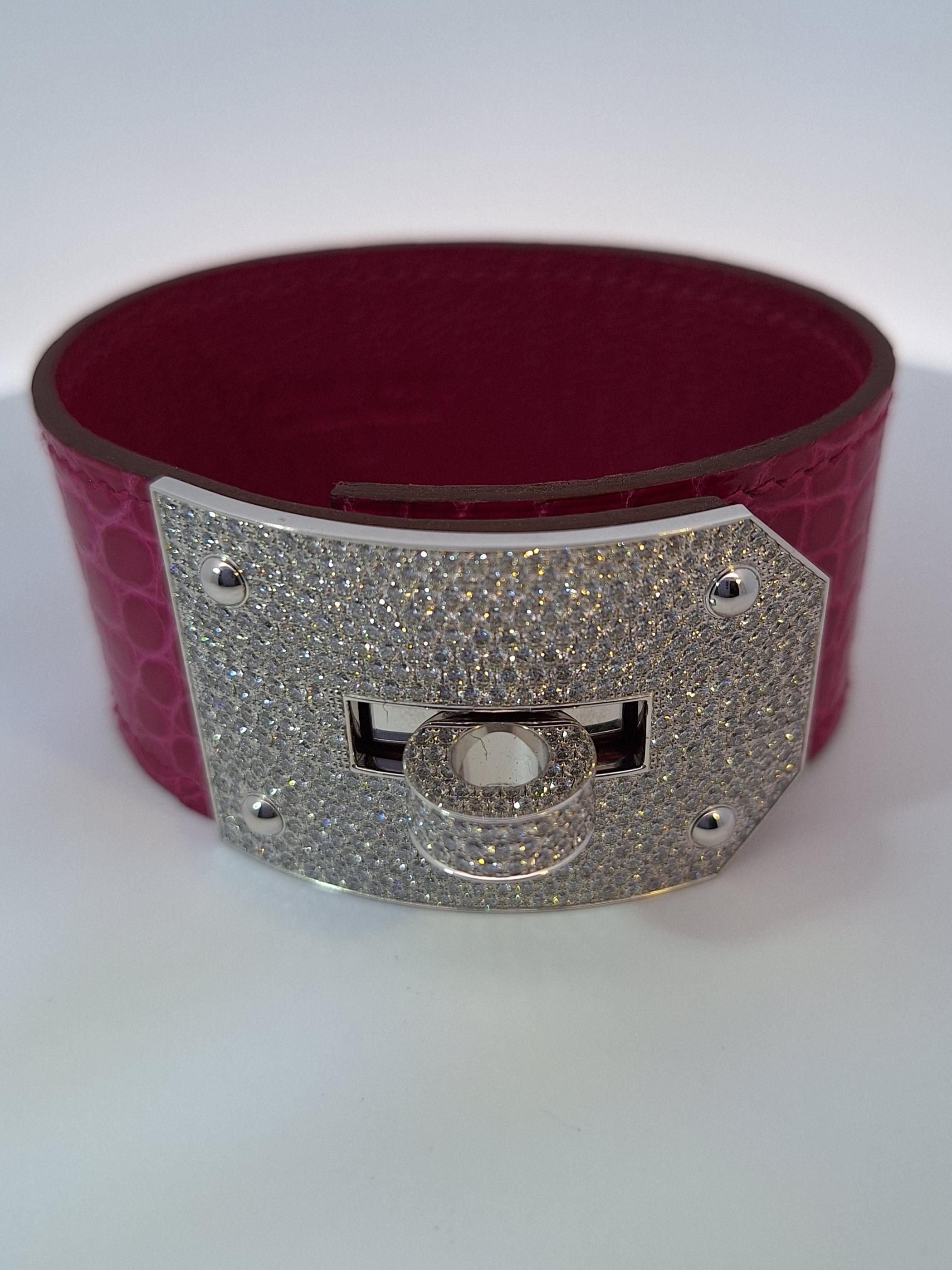 18k White Gold Diamond Kelly Fuchsia Crocodile Wide Cuff Bangle Bracelet by Hermes. With 493 Round brilliant cut diamonds VVS1 clarity, E color total weight approximately 6.75ct This bracelet comes with original Hermes box.

Details: Length: 6.5