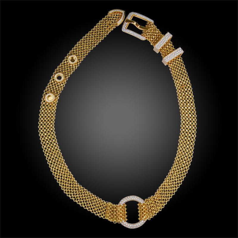 A magnificent and extremely rare piece by Hermes, designed to be worn separately as a necklace and bracelet or together as one long necklace, this exceptional set is comprised with 18k yellow gold, brilliant diamond embellished links and buckle. The