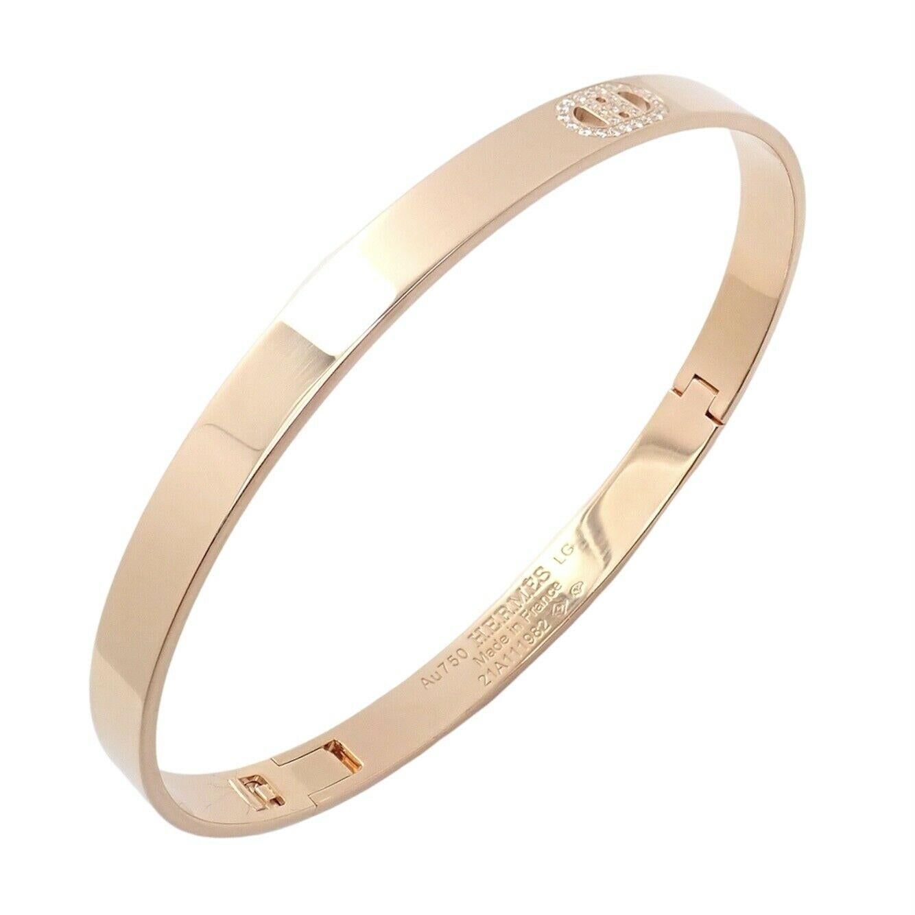 18k Rose Gold Diamond H D'Ancre Große Größe Armreif Armband von Hermes. 
Mit 27 runden Diamanten im Brillantschliff VVS1 Reinheit E Farbe Gesamtgewicht ca. .07ct
Einzelheiten: 
Länge: Größe: Länge: 6.7