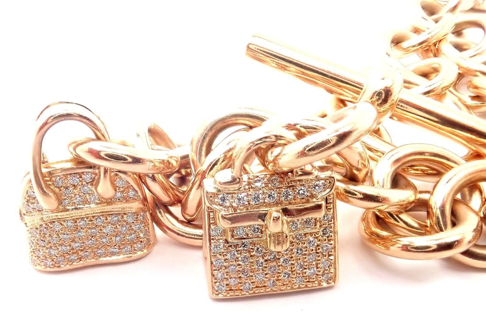 18k Rose Gold Diamond Signature Iconic Hanging Bag Charms Link Bracelet by Hermes. 
Includes a total of 4 Hermes bag charms: 
With 510 Brilliant Cut Diamonds VVS1 clarity, E color total weight approximately 1.97ct
5 diamond iconic bag charms: