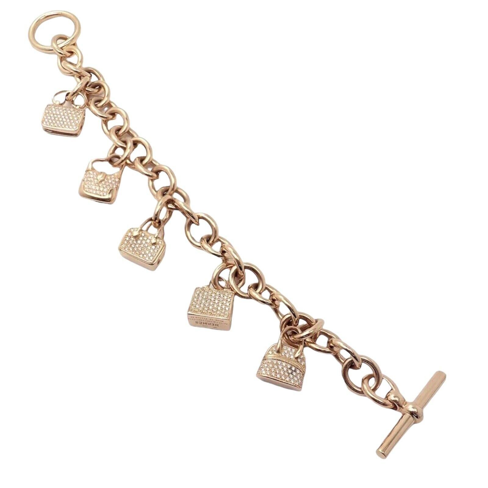 18k Rose Gold Diamond Signature Iconic Hanging Bag Charms Link Bracelet by Hermes. 
Includes a total of 4 Hermes bag charms: 
With 510 Brilliant Cut Diamonds VVS1 clarity, E color total weight approximately 1.97ct
5 diamond iconic bag charms: