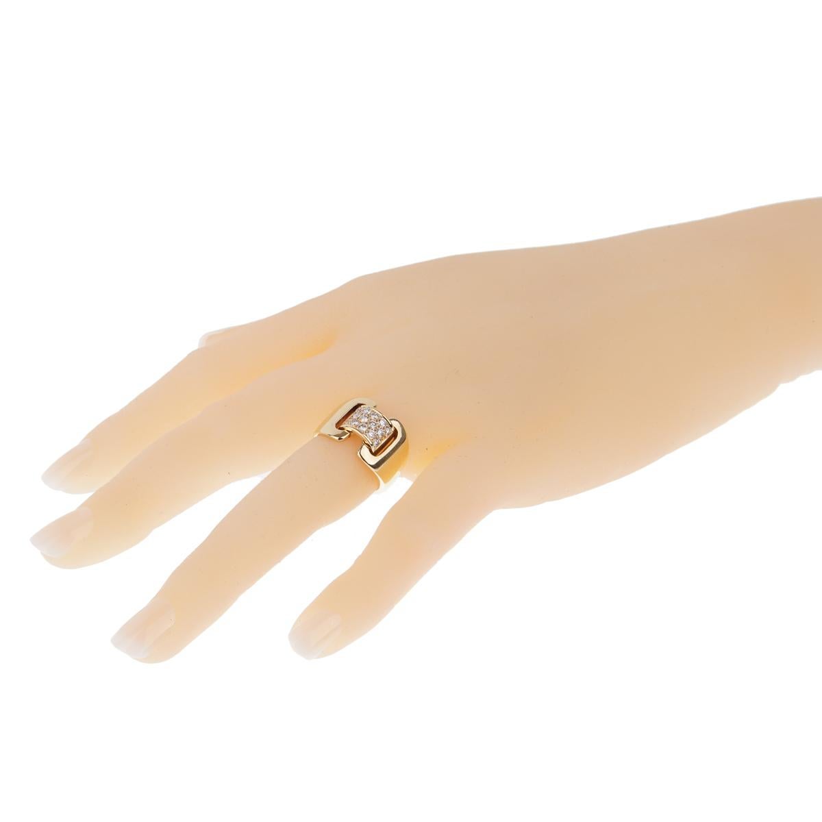 Crafted in 18kt yellow gold, the diamond yellow gold cocktail ring's wide bands connect with a square motif adorned with the finest Hermes round brilliant cut diamonds (.38cts) in 18k yellow gold.

Width: .51