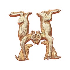 Hermès Doe and Dog Forming an H Brooch in Golden Metal