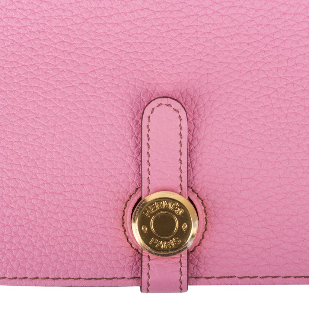 Coveted Hermes Dogon GM  wallet features rare 5P Pink in Togo leather.
This beauty is accentuated with Gold hardware.
NEW or NEVER WORN 
Comes with original signature HERMES box.  
final sale

WALLET MEASURES:
7.75