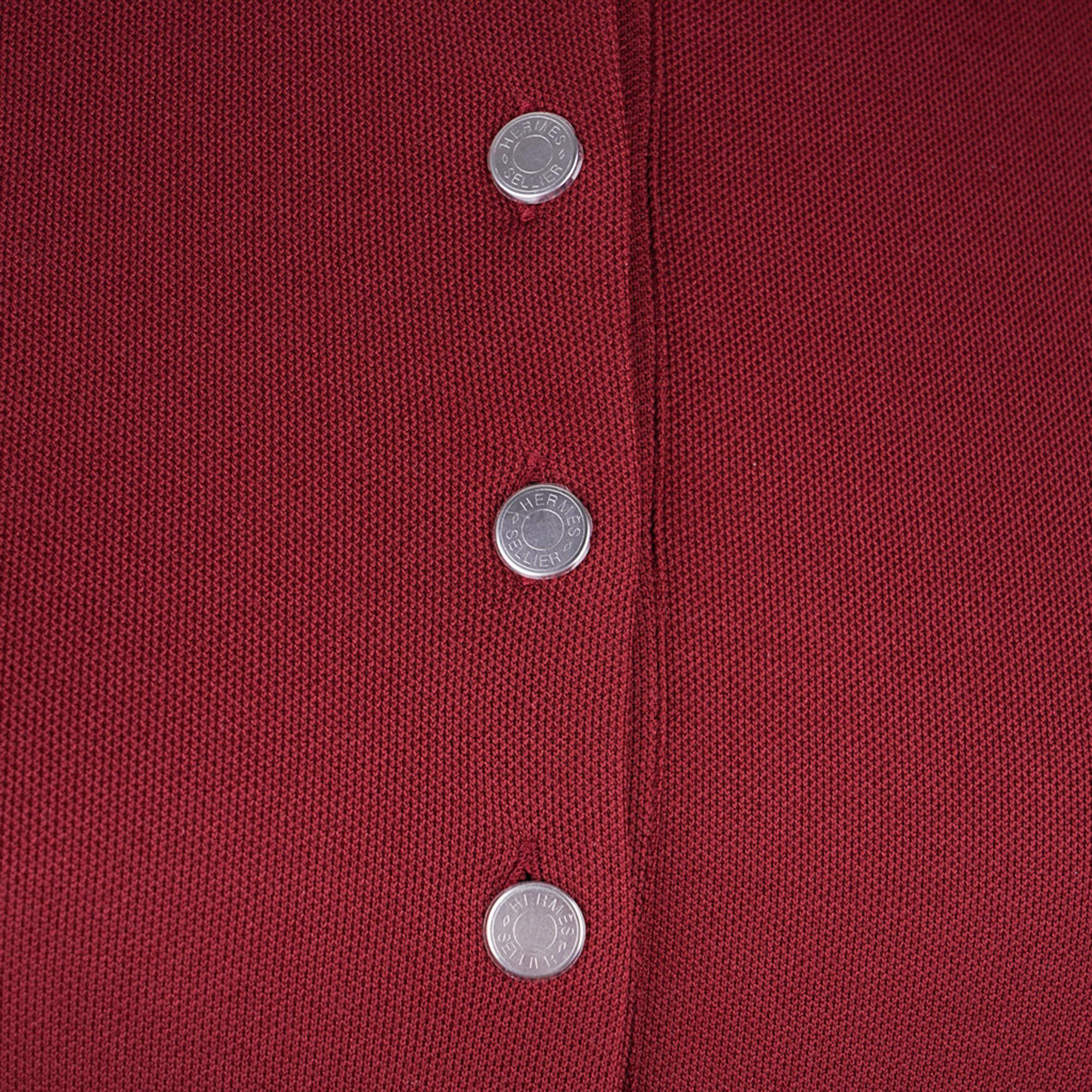 Mightychic offers a guaranteed authentic Hermes Double Jeu Technical Polo featured in Rouge H with Navy Trim.
Part of the Equestrian Collection.
4 Clou de Selle buttons.
Polo has short sleeve with straight fit and stretchy, breathable