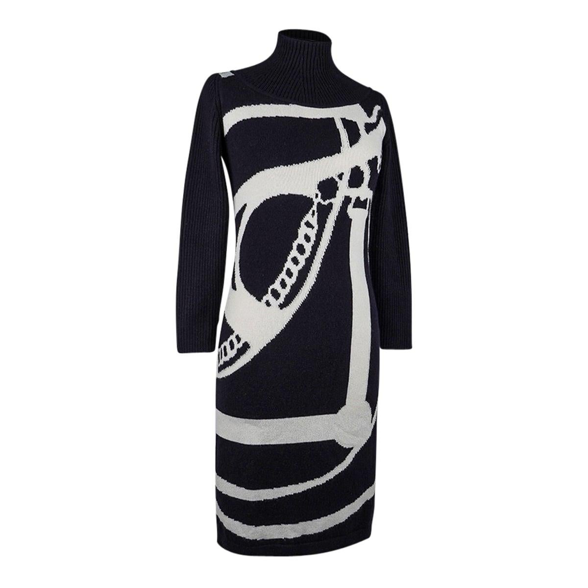 Mightychic offers an Hermes Promenade du Matin Intarsia sweater dress featured in Black and White.
Beautiful in a jacquard cashmere knit with Promenade du Matin intarsia motif.
Black mock turtleneck and black sleeves pullover dress.
Classic abd