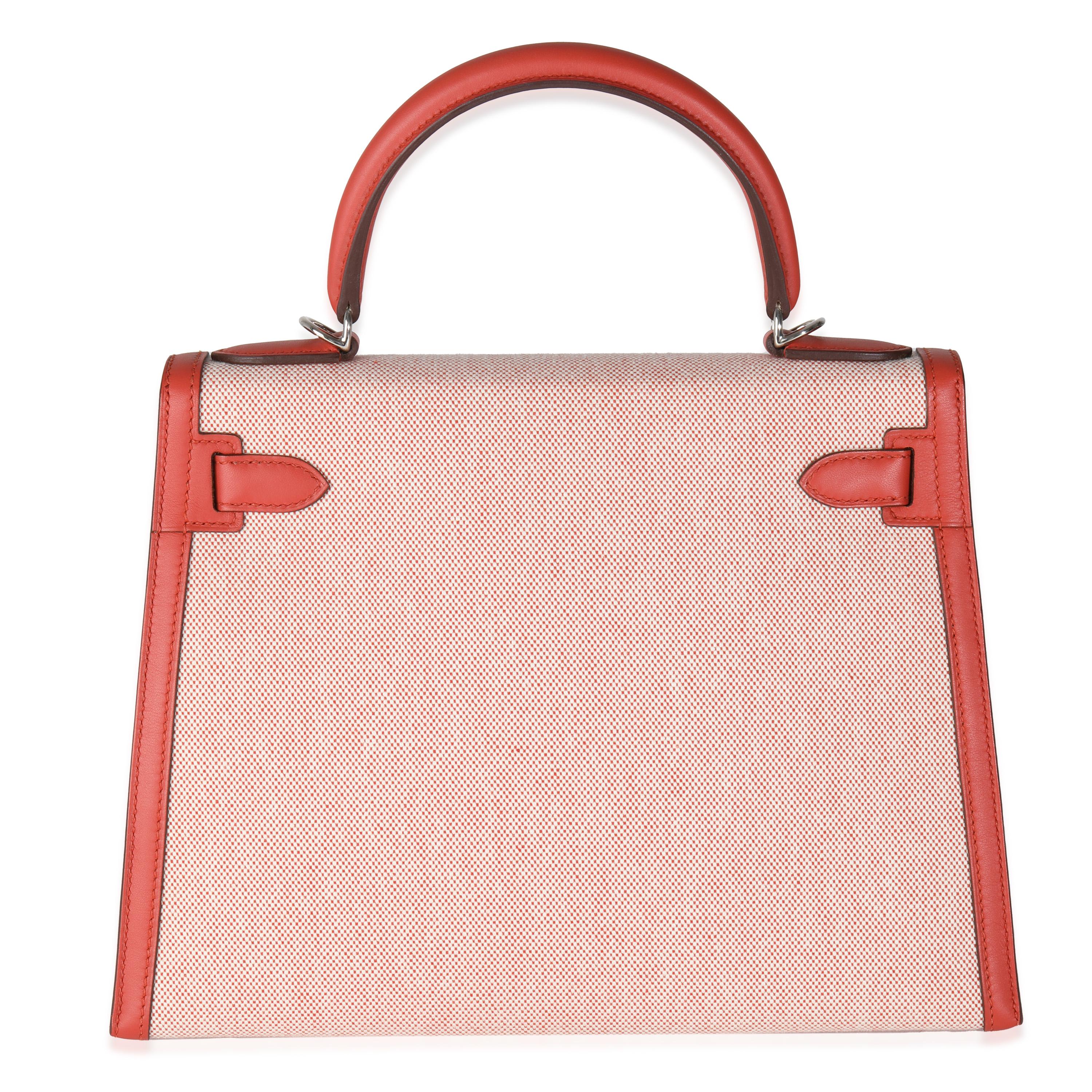 Listing Title: Hermès Ecru Brique Terre Battue Toile Quadrille Swift Sellier Kelly 28 PHW
SKU: Z145190
Condition: Pre-owned 
Condition Description: Officially renamed in 1977, the Kelly tote bag from Hermès was originally called the Sac à Dépêches