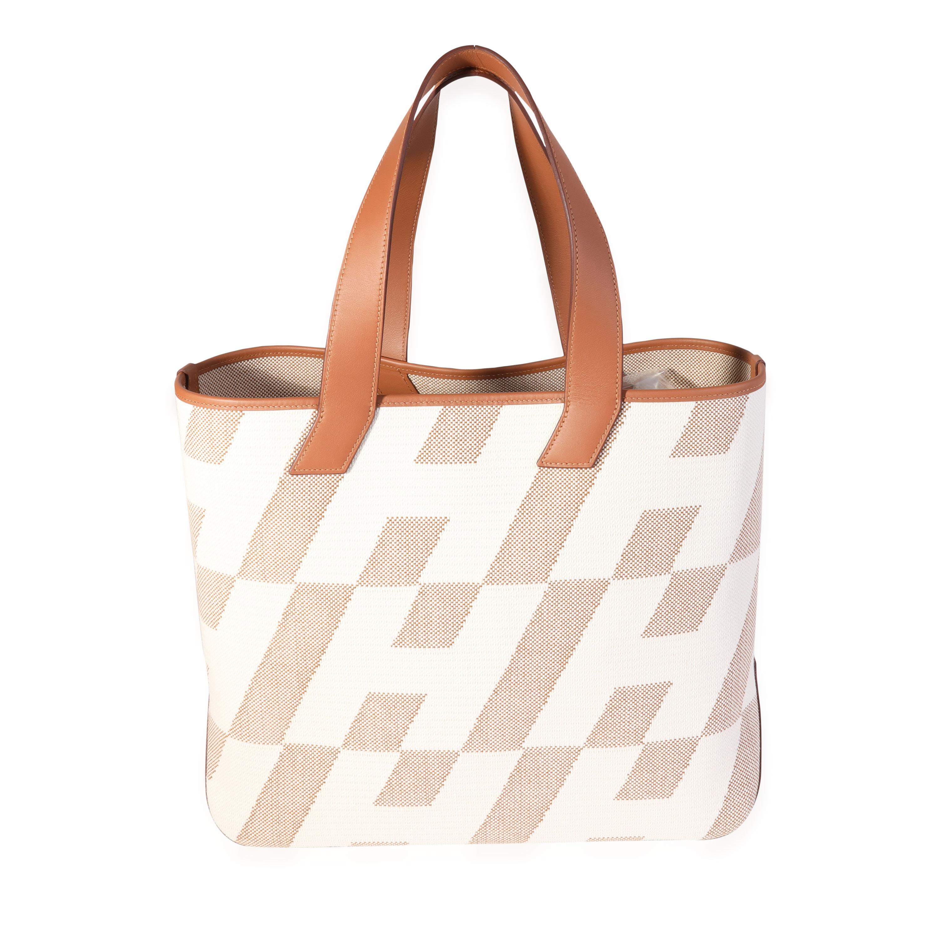Listing Title: Hermès Ecru Toile & Gold Swift Cabas H En Biais 40
SKU: 119790
MSRP: 3400.00
Condition: Pre-owned (3000)
Handbag Condition: Excellent
Condition Comments: Excellent Condition. Faint indentation to leather. No other visible signs of