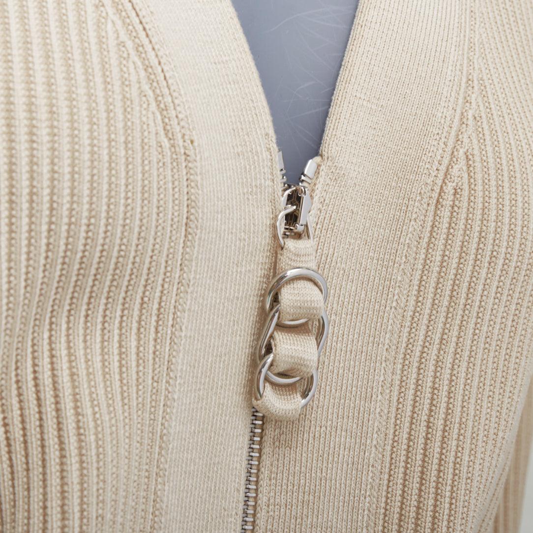 HERMES ecru viscose silk silver zipper head ribbed crop cardigan FR36 S
Reference: KYCG/A00079
Brand: Hermes
Material: Viscose, Silk
Color: Beige, Silver
Pattern: Solid
Closure: Zip
Extra Details: Front zip.
Made in: Italy

CONDITION:
Condition:
