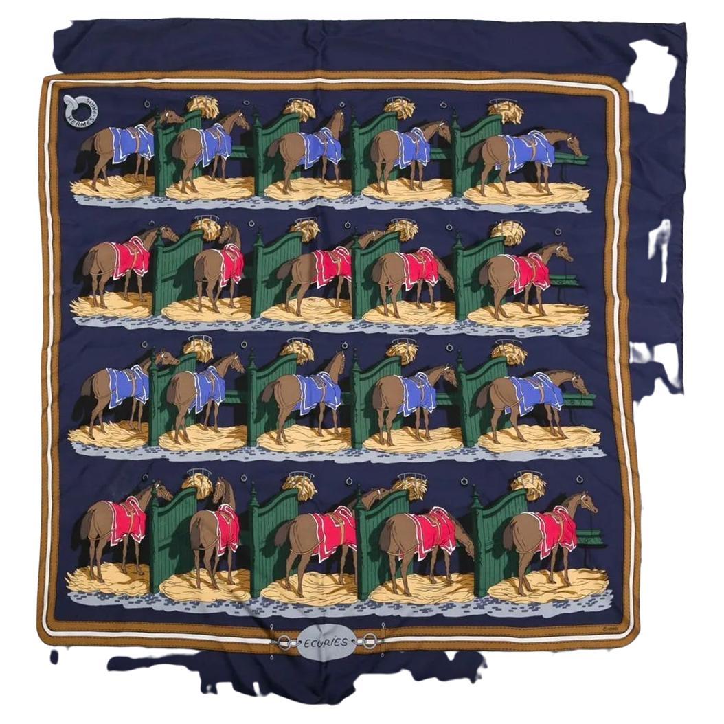 First designed by Hugo Gryckar in 1947 and reissued in 1993, the Ecuries (stables) silk scarf took inspiration from a painting by Theodore Gericault and from a collection of artifacts owned by Emile Hermes. As the name suggests, the scarf features