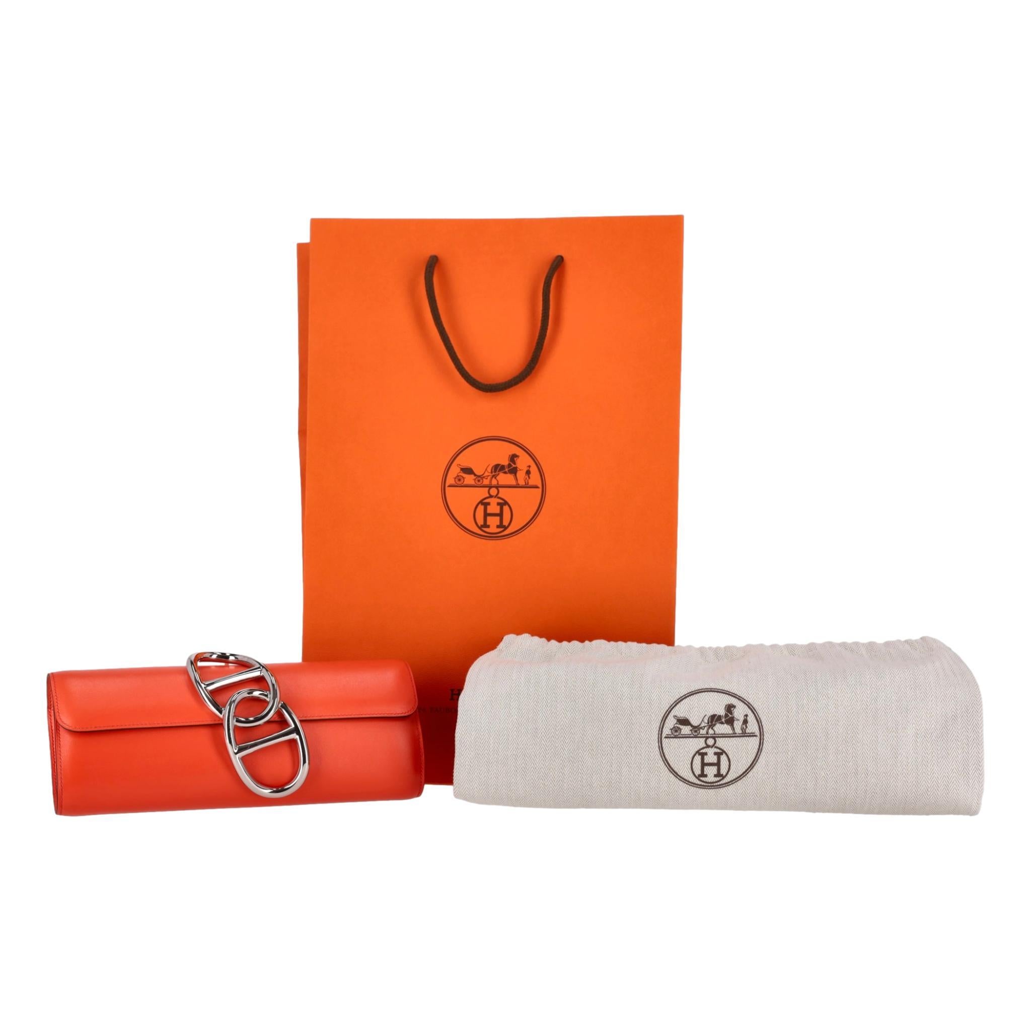 Hermes Egee Clutch Bag In Tadelakt Leather

Capucine orange clutch crafted from soft Tadelakt calfskin leather.

Designed with a front flap featuring signature magnetic double palladium Chaine d'Ancre.

Opening to a matching leather interior with