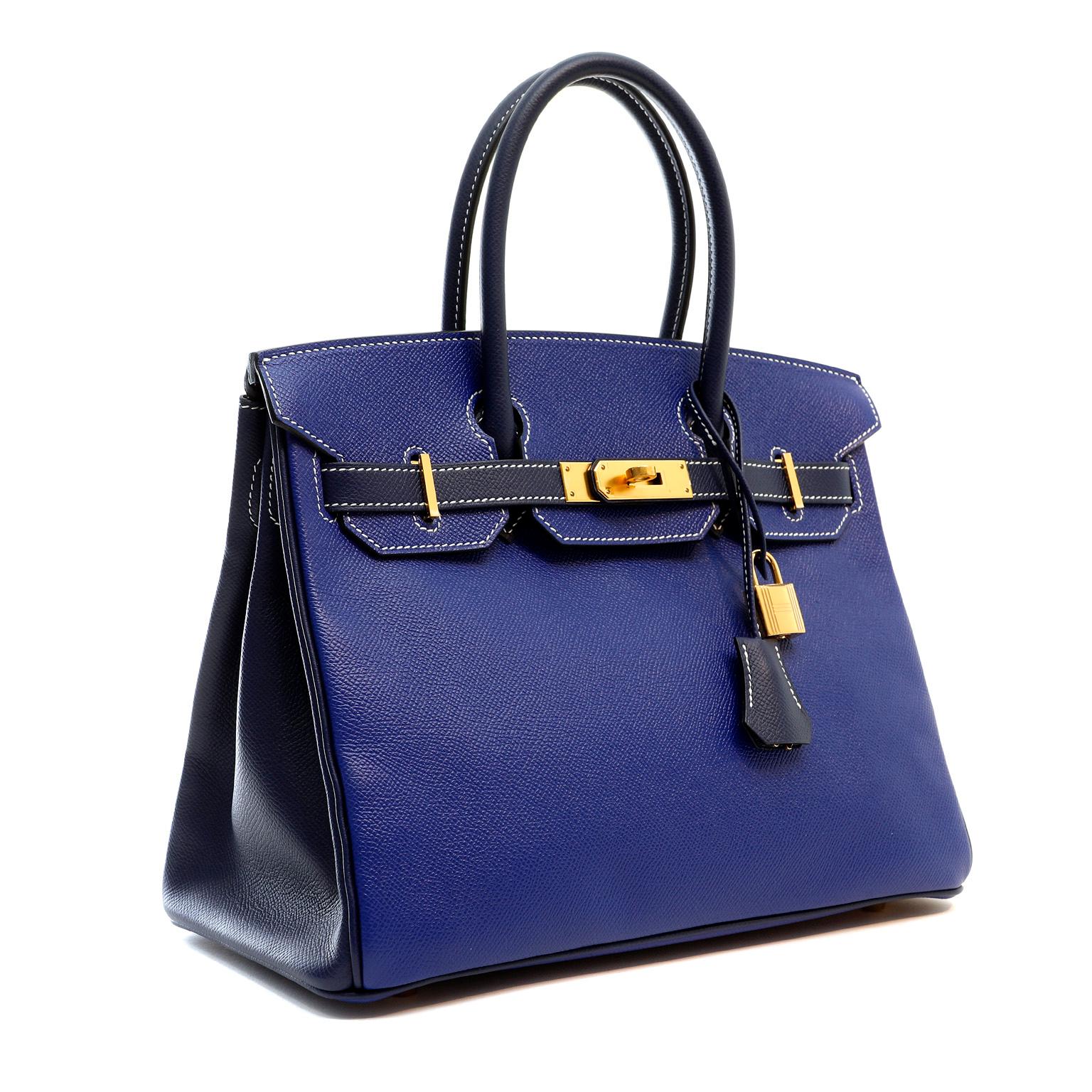 This authentic Hermès Electric Blue and Sapphire Epsom 30 cm Horseshoe Birkin is in pristine unworn condition with the plastic intact on the hardware. Horseshoe Birkins are specially ordered and only offered to select clientele.  This is a rare and