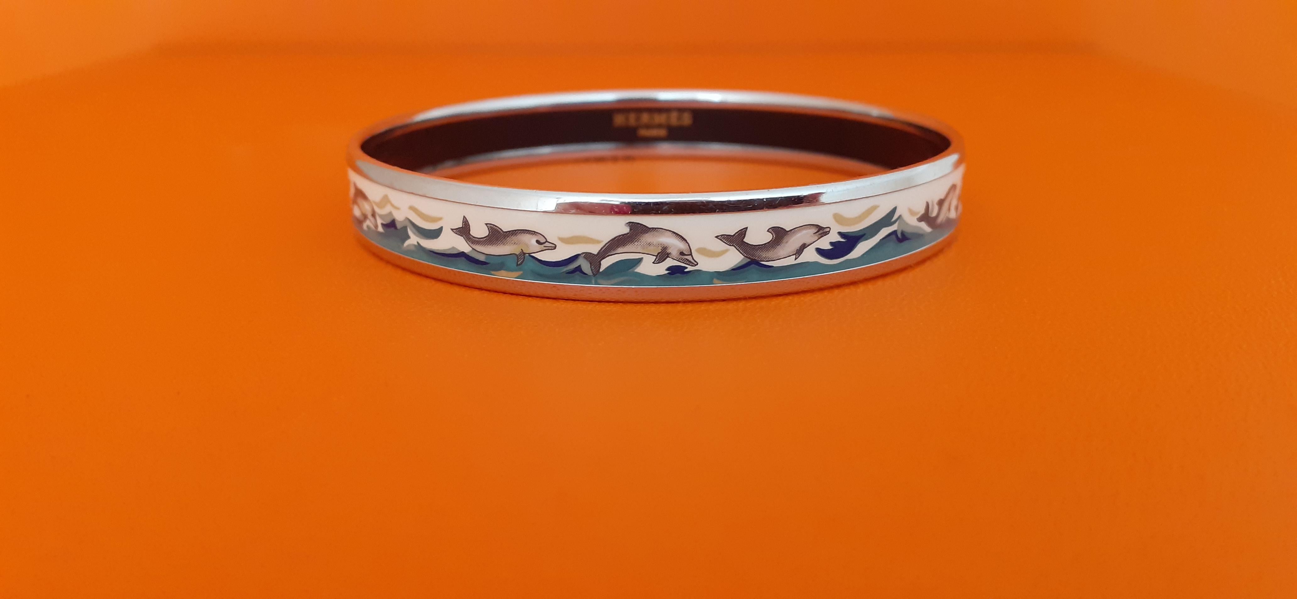 Beautiful Authentic Hermès Bracelet

Print: Dolphins in See


