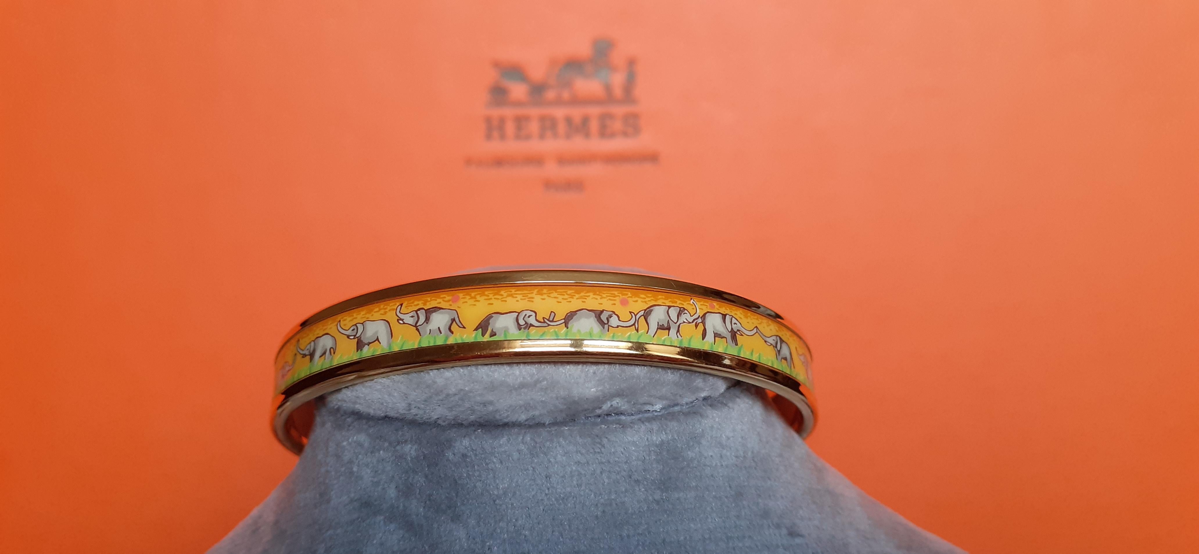 Super Cute Authentic Hermès Bracelet

Print: Elephants Grazing

Hard to find ! One of the most thought after Hermès Bracelet

Made in Austria + I

Made of printed enamel and yellow gold plated hardware

Colorways: Yellow background with discreet
