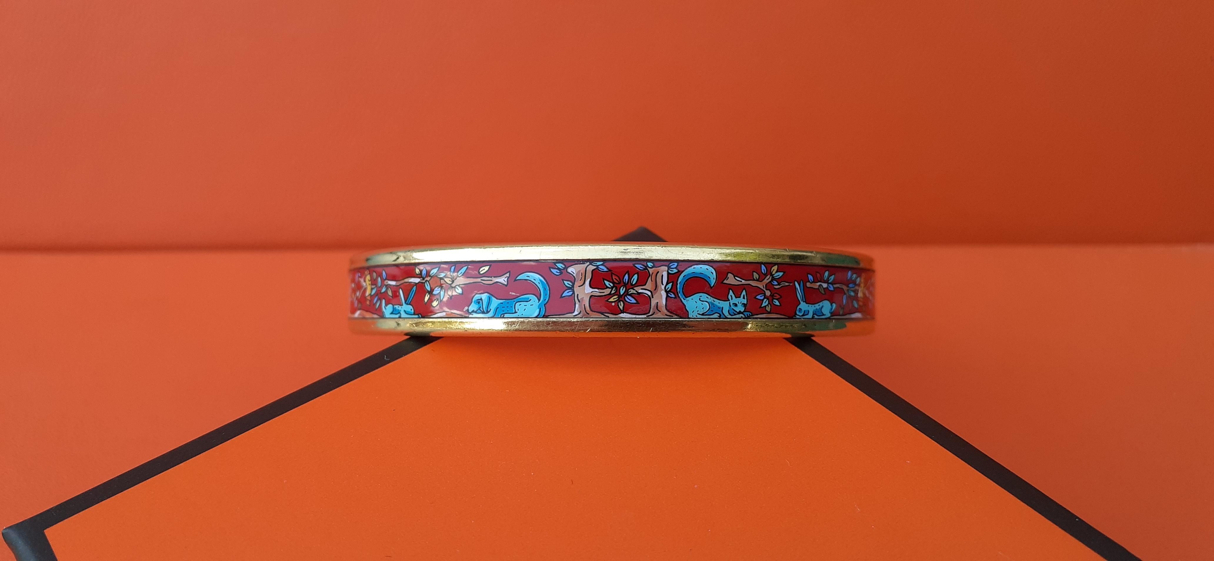 Super Cute Authentic Hermès Bracelet

Pattern: cute Cats, Dogs, Rabbits, Birds, Trees drawing an H

Made in Austria + F

Made of Printed Enamel and Gold plated Hardware

Colorways: Red, Turquoise Blue, Yellow, Brown

Some small leaves are golden, it