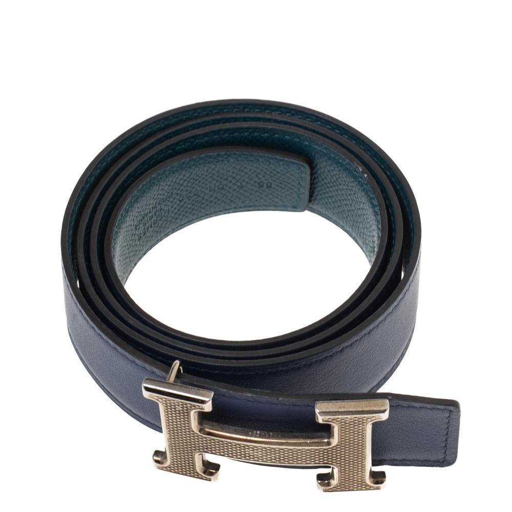 Coming from the House of Hermes, this Guillochee Finish H belt will certainly grant signature beauty and luxury to your accessory repertoire. It is crafted from Bleu Encre/Colvert Epsom and Swift leather, with an H accent perched on the front. This