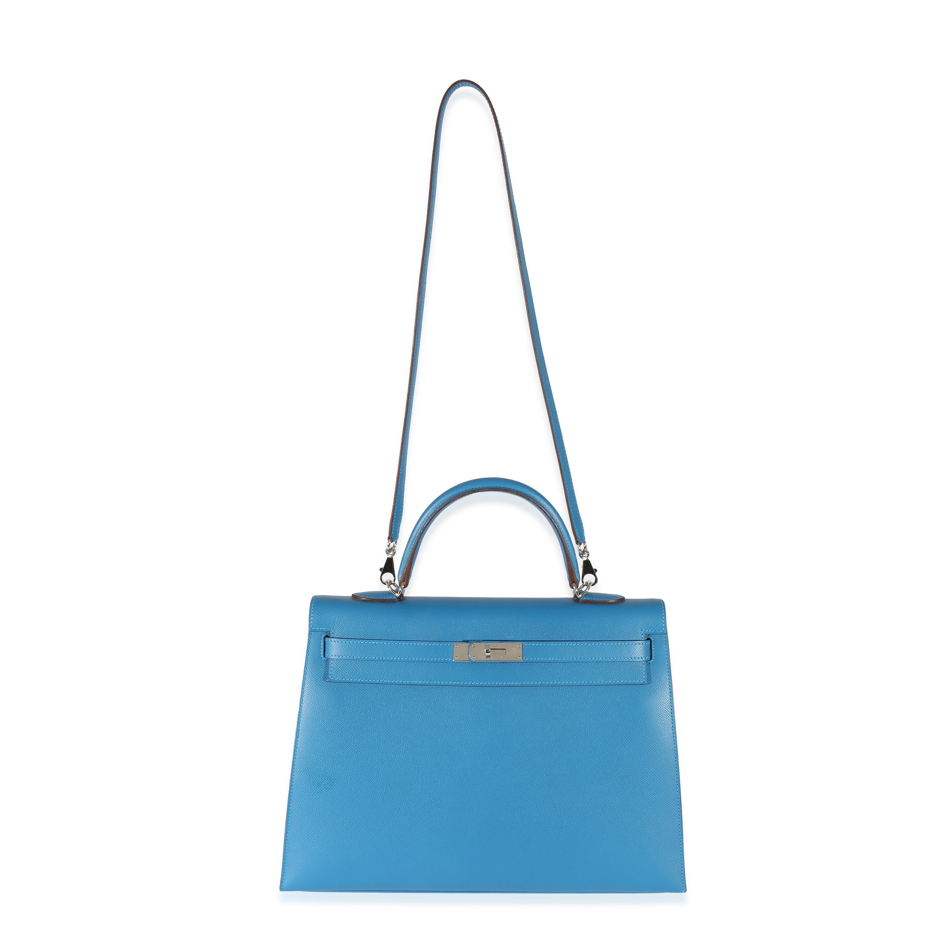 Listing Title: Hermes Epsom Bleu Izmir Sellier Kelly 35 PHW
SKU: 129230
Condition: Pre-owned 
Condition Description: Officially renamed in 1977, the Kelly tote bag from Hermès was originally called the Sac à Dépêches (which translates as ‘the