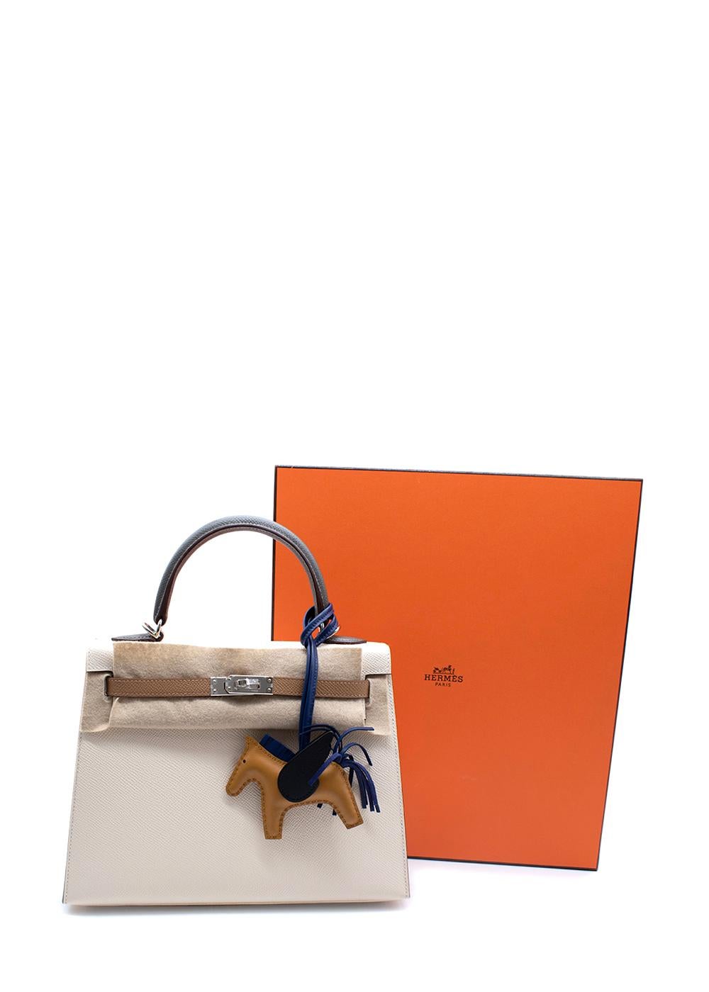 Hermes Epsom Leather Craie & Etain HSS Mini Kelly 20 PBHW

- Super chic mini itineration of the Kelly bag
- Rodeo PM charm in supple leather attached 
- Crafted in Epsom leather accentuated with Palladium hardware
- Comes with a signature Hermes box