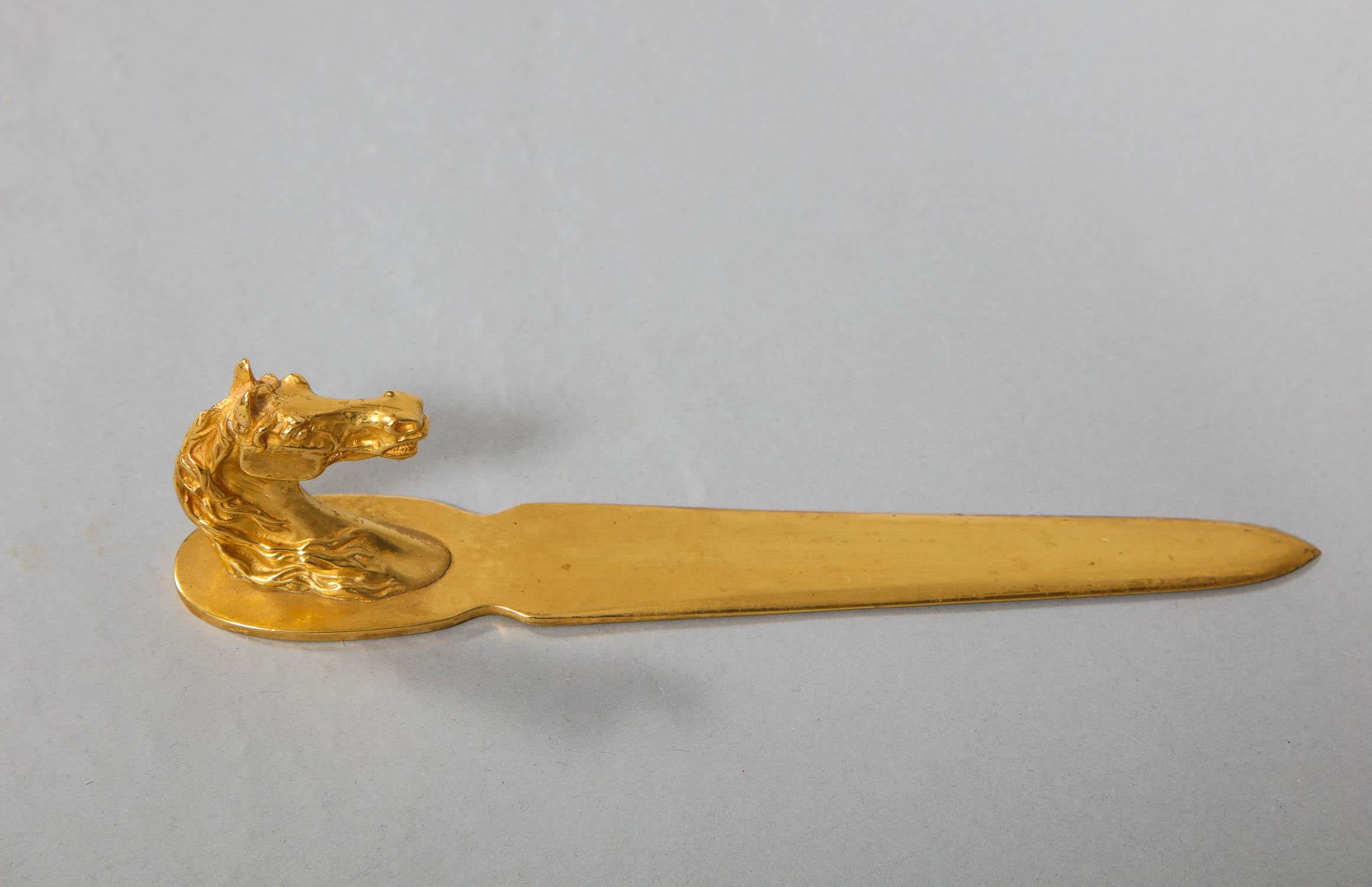 A gold-plated equestrian letter opener with a horse's head handle, stamped Hermes, Paris. This is an iconic Hermes design of the seventies, and is a must-have on any gentleman collector's wishlist. Purchased directly from Hermes' flagship Paris