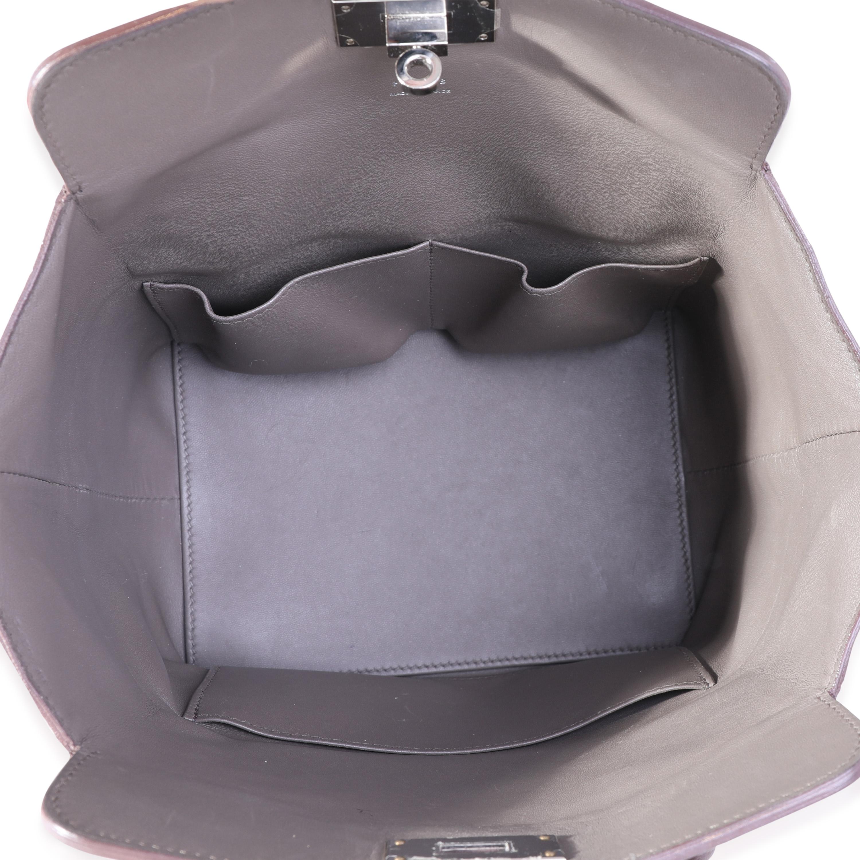 Listing Title: Hermès Etain Evercolor Toolbox 20 PHW
SKU: 115094
MSRP: 7650.00
Condition: Pre-owned (3000)
Handbag Condition: Very Good
Condition Comments: Very Good Condition. Plastic on some hardware. Scuffing to corners. Light scuffs throughout