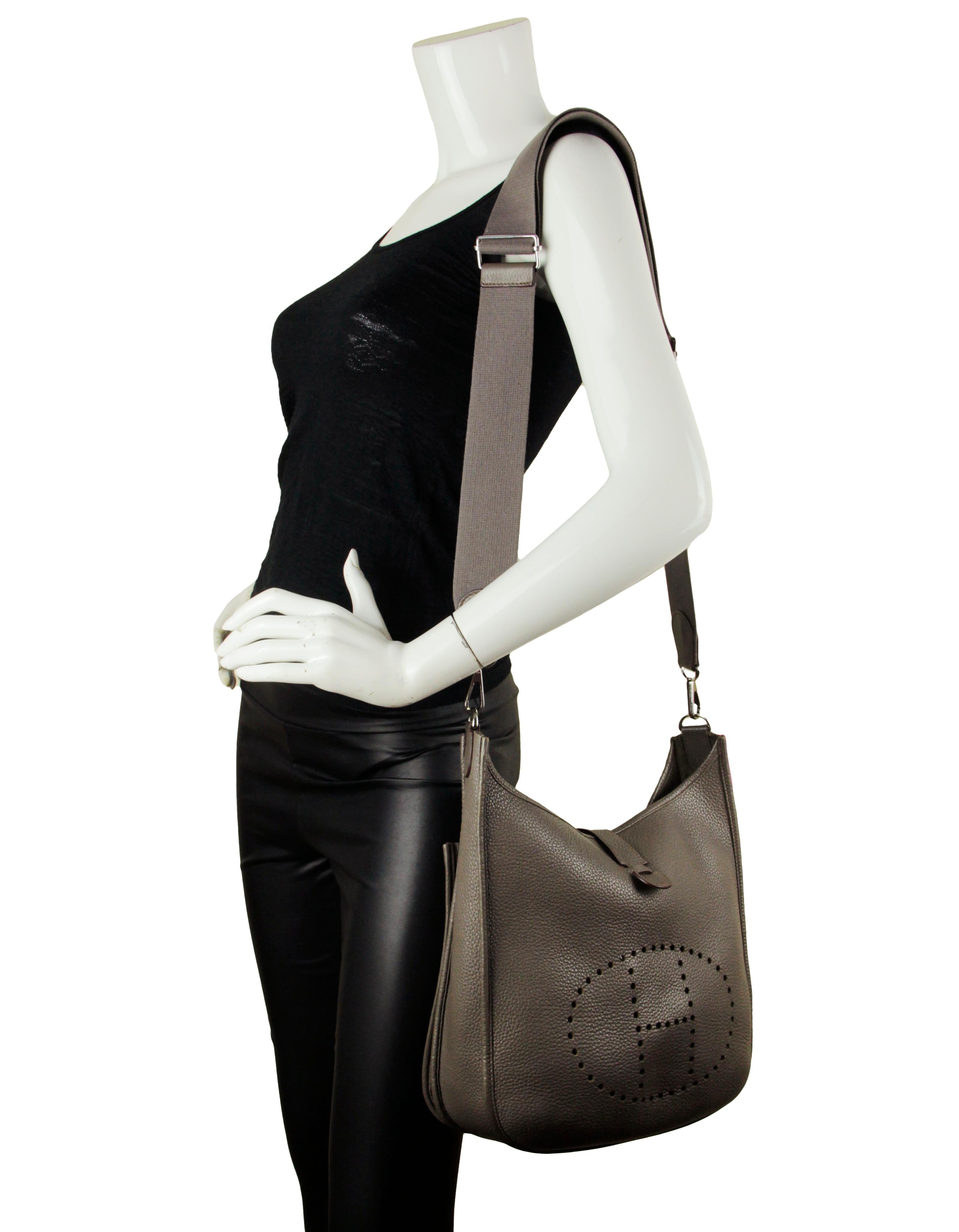 Hermes Etain Grey Clemence Leather Evelyne III GM Messenger Bag
Made In: France
Color: Etain grey
Year of Production: 2013
Hardware: Palladium
Materials: Clemence leather, metal
Lining: Suede
Closure/Opening: Open top with leather strap and snap