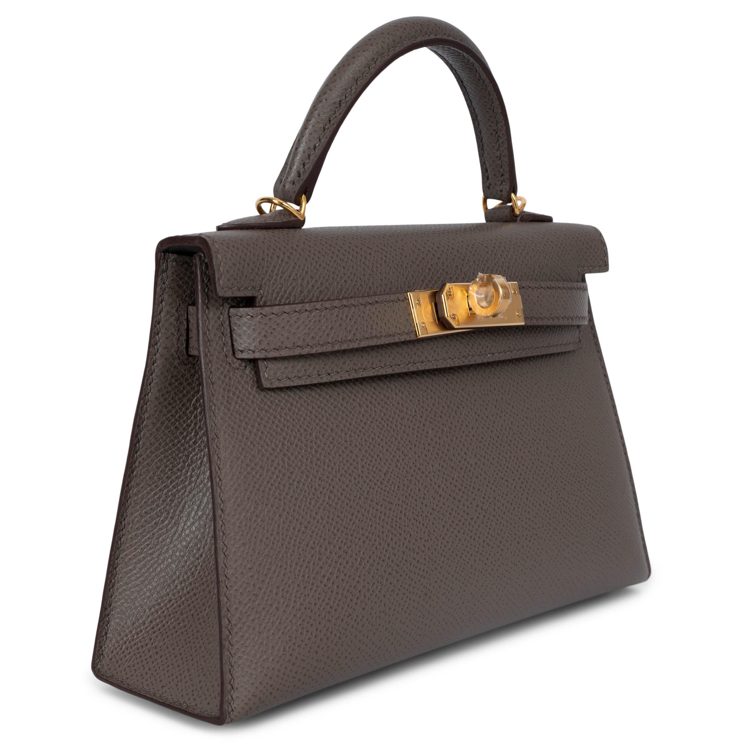 100% authentic Hermès Mini Kelly 20 Sellier bag in Etain (dark grey) Veau Epsom leather with gold-plated hardware. Lined in lamb skin leather with an open pocket against the back. Brand new - comes with Full Set.

Measurements
Model	H071302CC