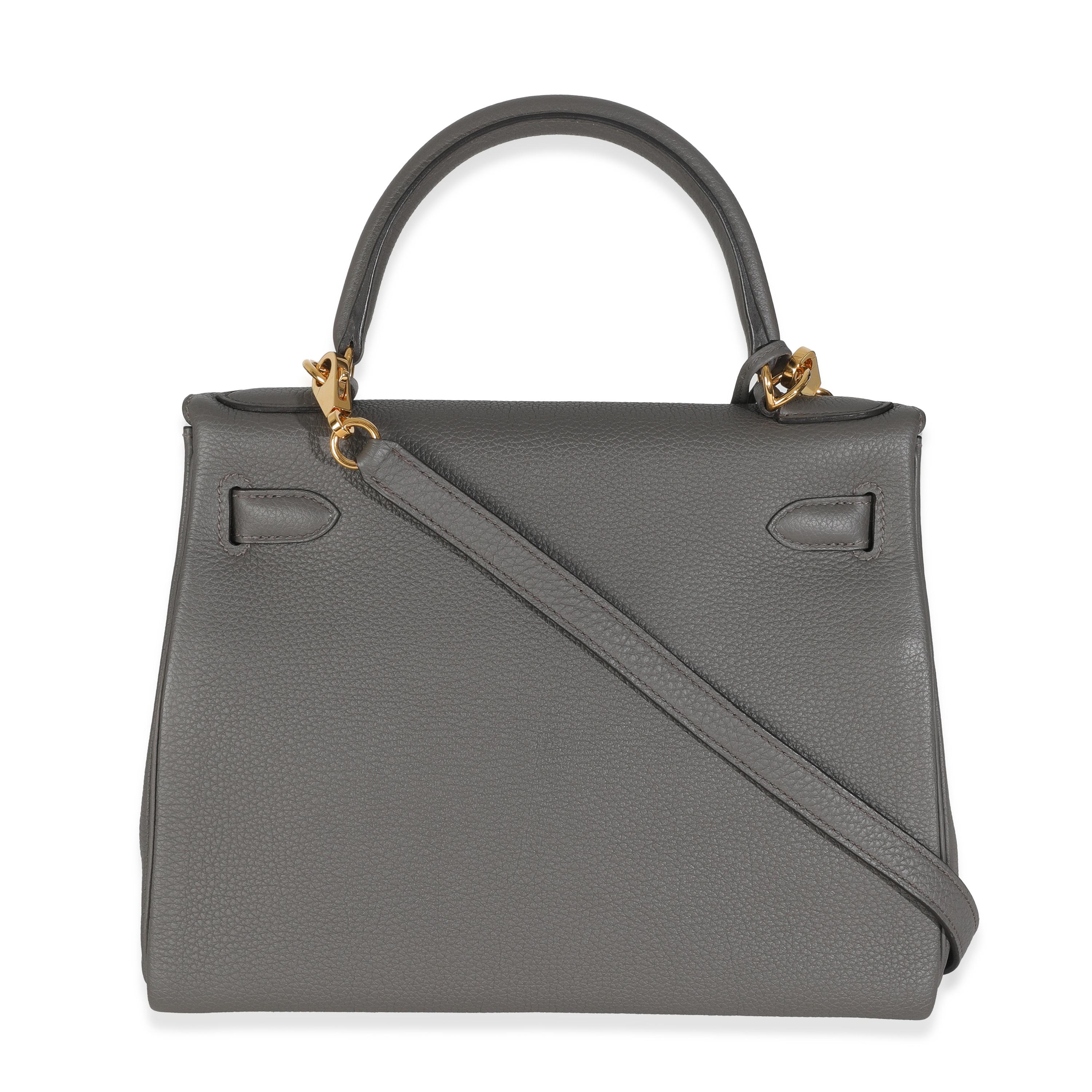 Hermès Etain Togo Retourne Kelly 28 GHW
SKU: Z147450

Condition Description: Officially renamed in 1977, the Kelly tote bag from Hermès was originally called the Sac à Dépêches (which translates as ‘the dispatch bag’). The structured bag’s moniker