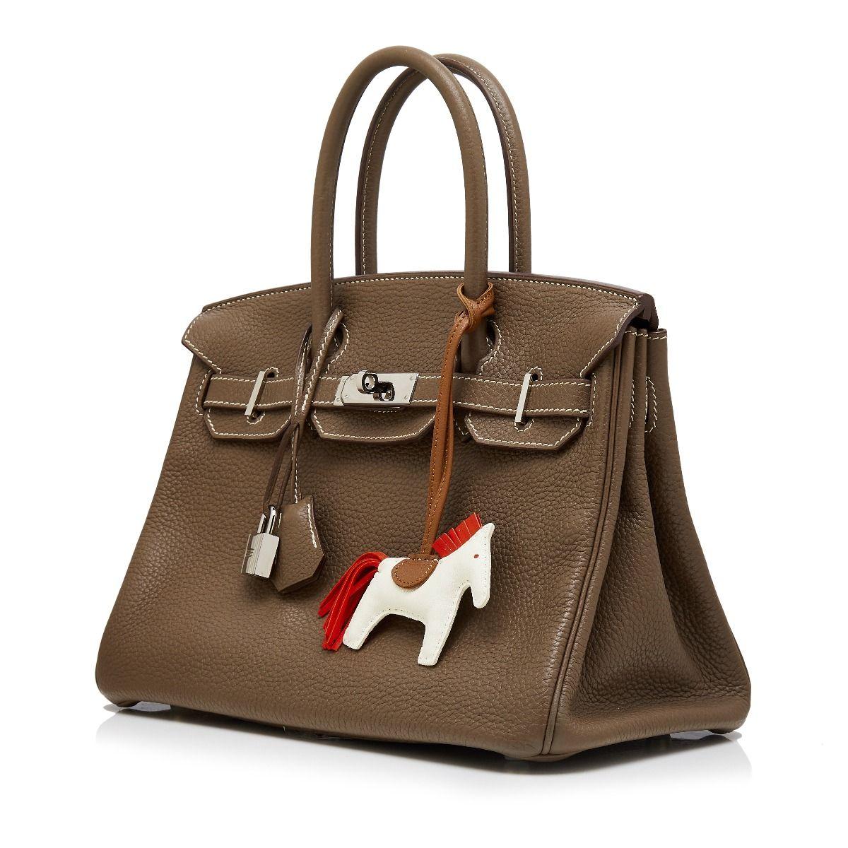 Adding a twist to the traditional Hermès Birkin, this truly spectacular, one-of-a-kind rarity combines a neutral etoupe leather exterior with silver-tone metal accents, for an effect that is unexpectedly modern and fresh. Crafted in France, this